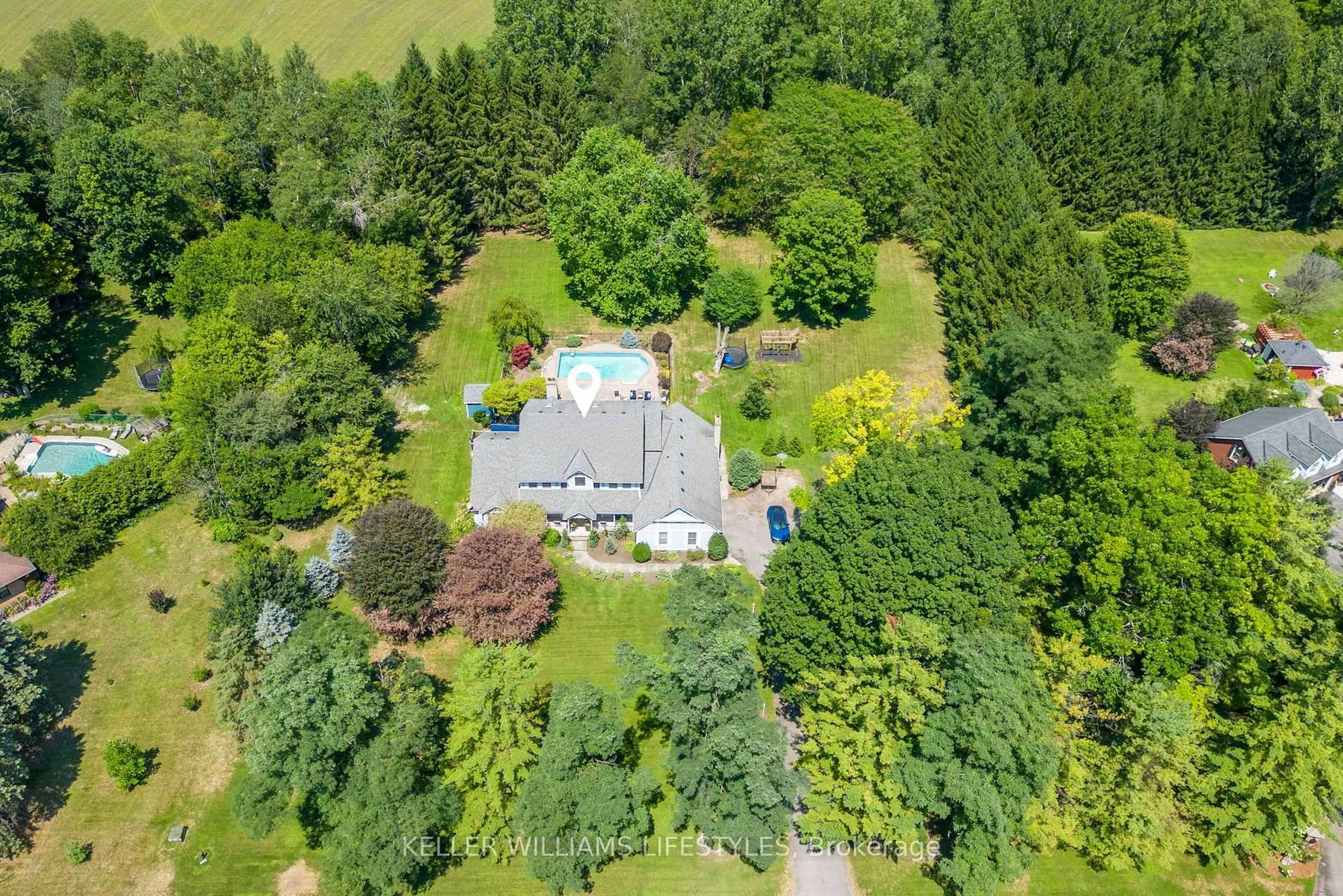 A pic from outside/outdoor area/front of a property/back of a property/a pic from drone, forest/trees view for 14 LANSDOWNE PARK Cres, Middlesex Centre Ontario N0L 1R0