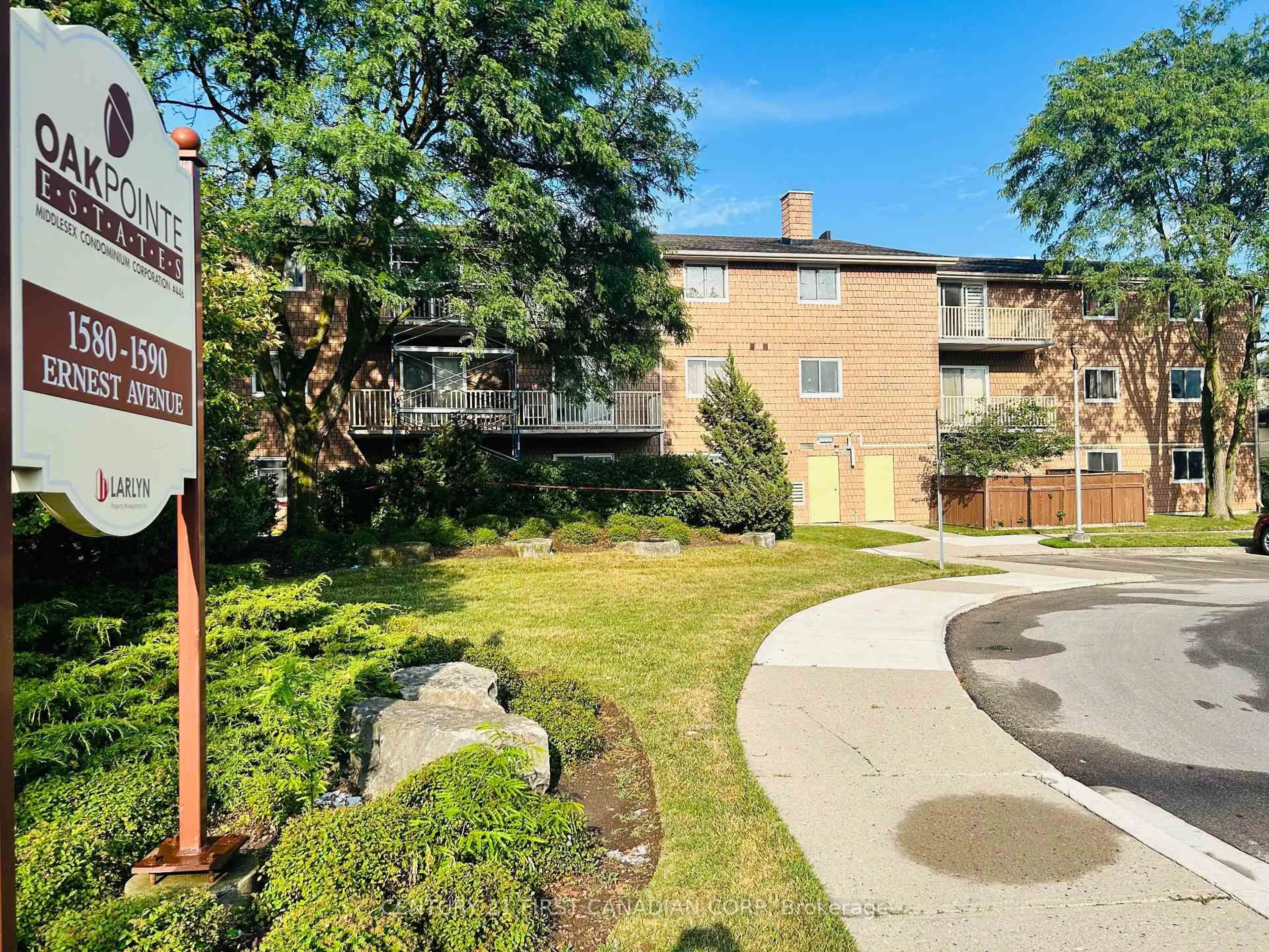 A pic from outside/outdoor area/front of a property/back of a property/a pic from drone, street for 1590 Ernest Ave #205, London South Ontario N6E 2V4