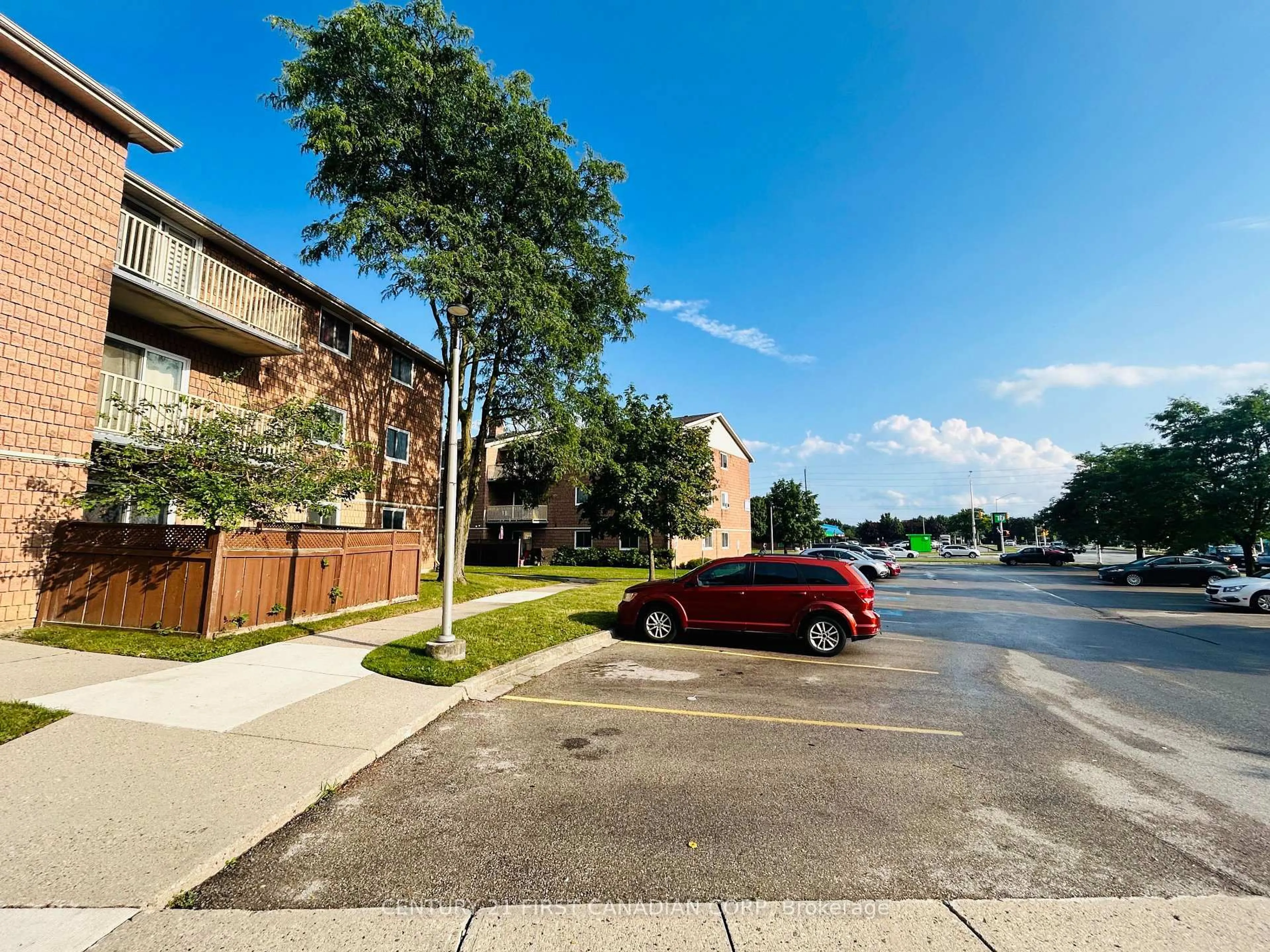 A pic from outside/outdoor area/front of a property/back of a property/a pic from drone, street for 1590 Ernest Ave #205, London South Ontario N6E 2V4