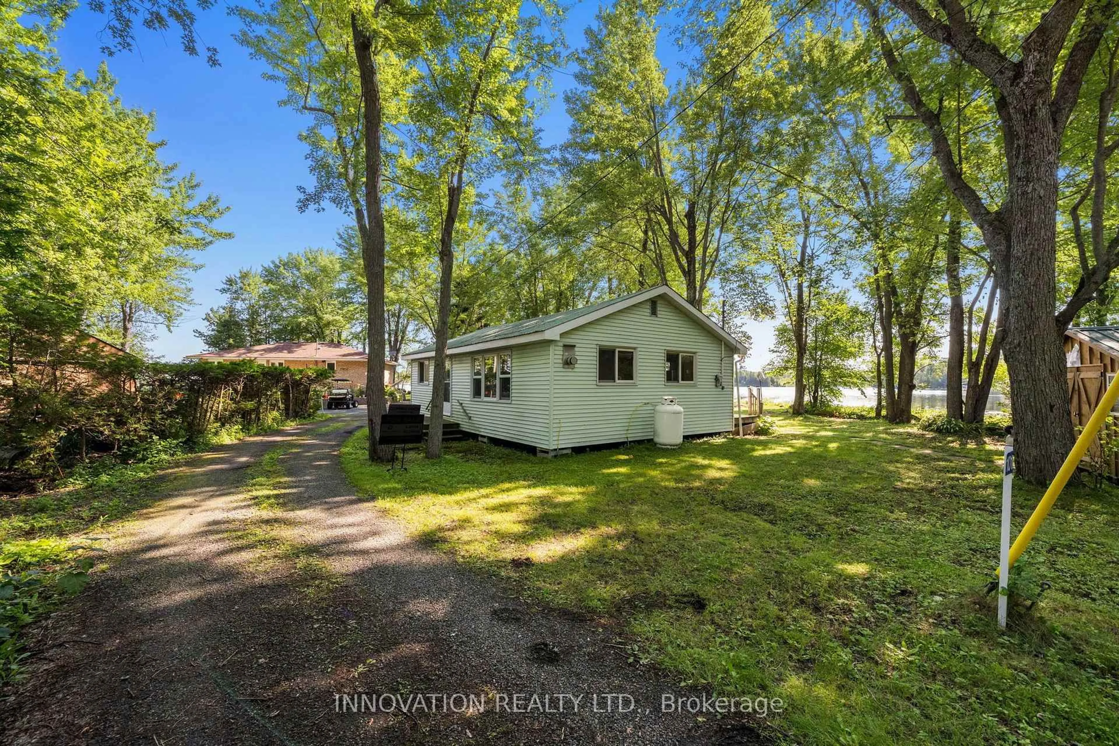 A pic from outside/outdoor area/front of a property/back of a property/a pic from drone, water/lake/river/ocean view for 101 Machin Dr, Perth Ontario K7H 3C8