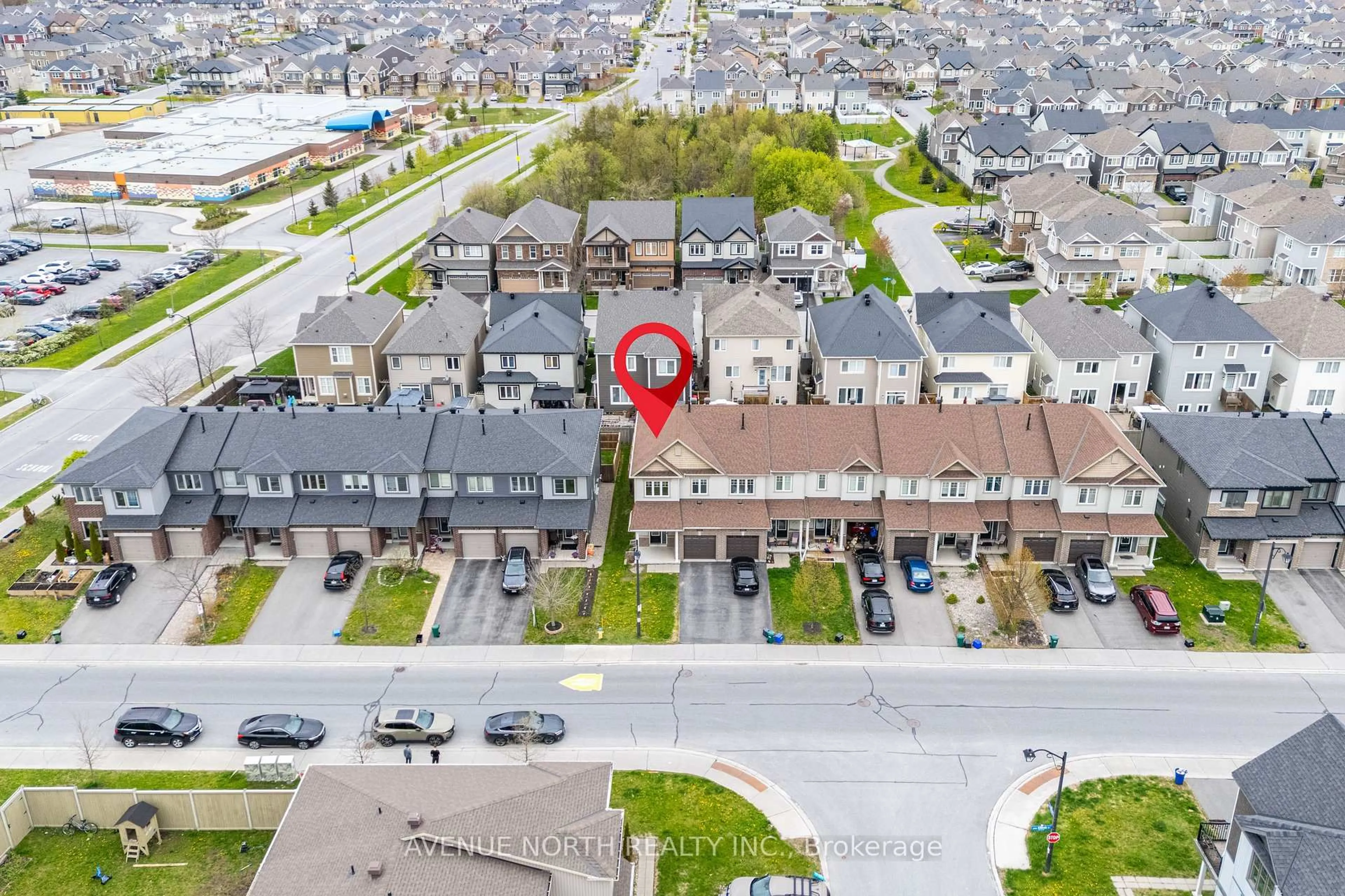 A pic from outside/outdoor area/front of a property/back of a property/a pic from drone, street for 940 Kilbirnie Dr, Ottawa Ontario K2J 5T9