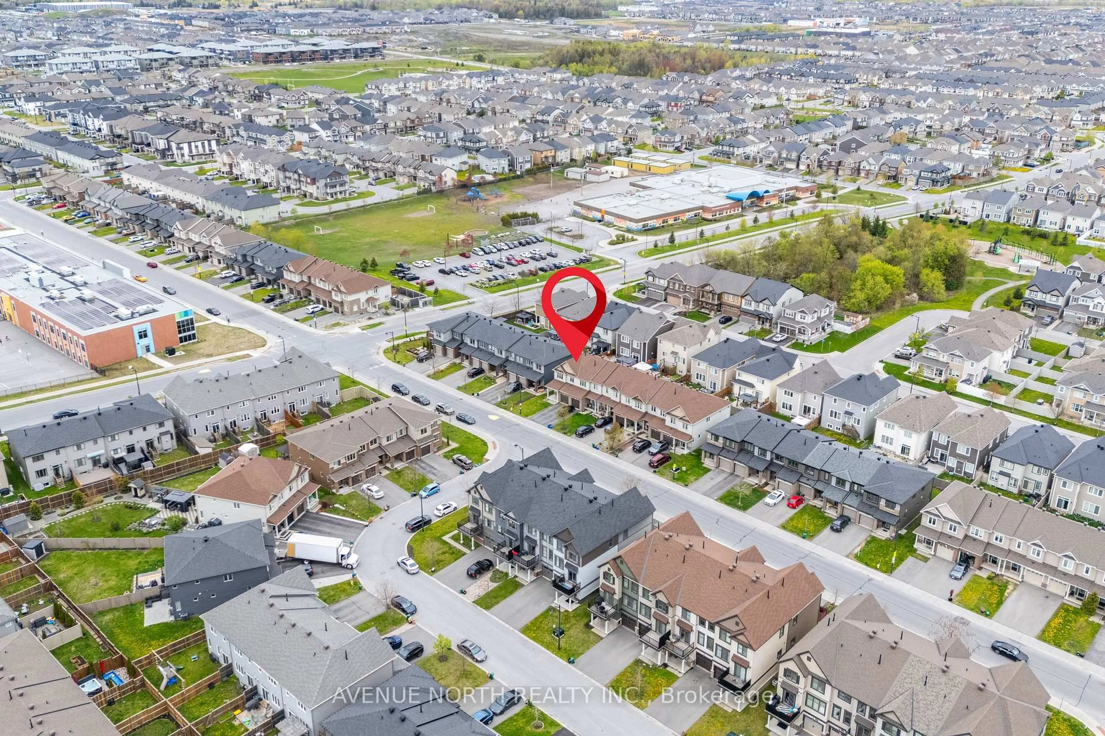 A pic from outside/outdoor area/front of a property/back of a property/a pic from drone, street for 940 Kilbirnie Dr, Ottawa Ontario K2J 5T9