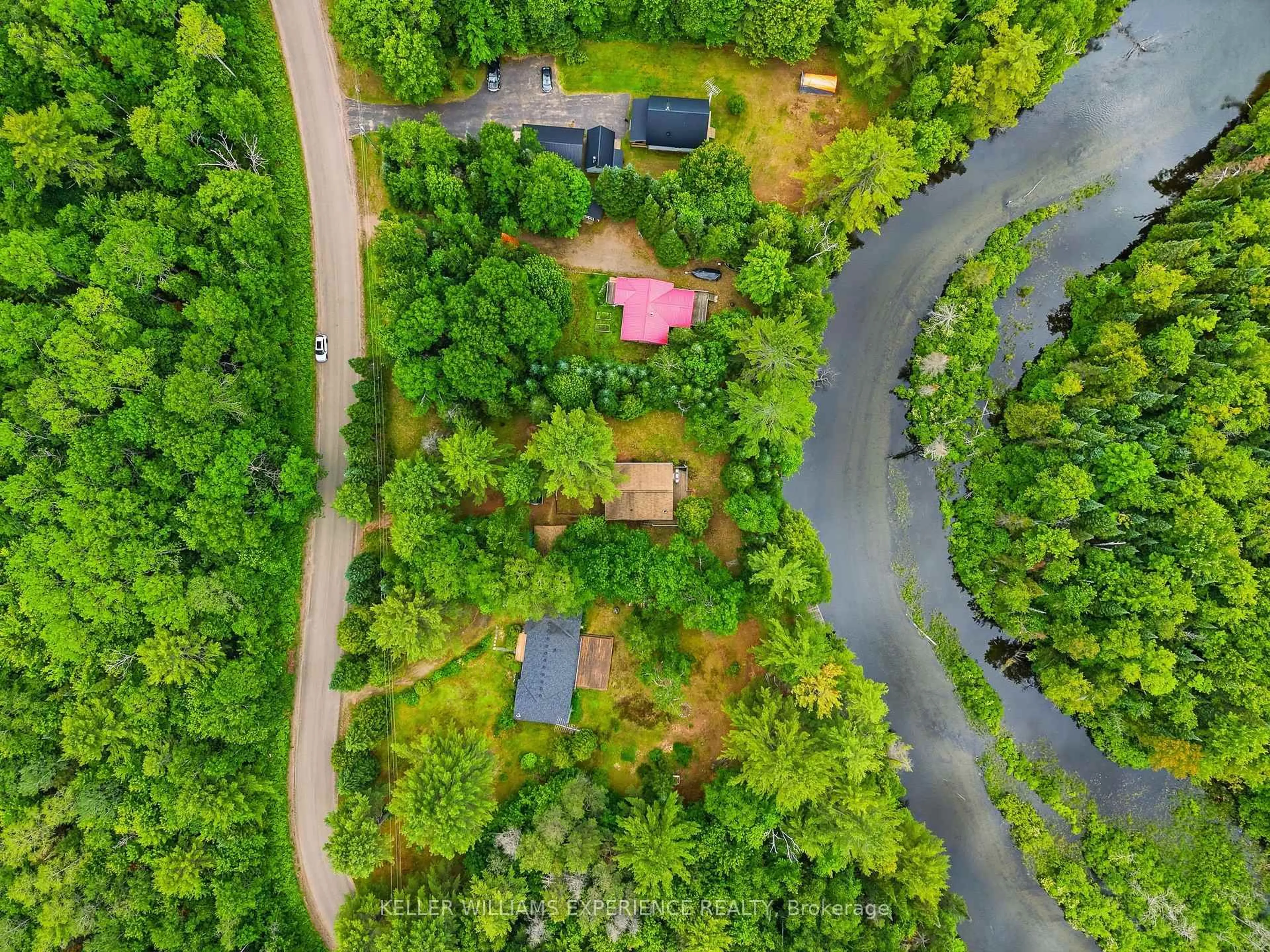 A pic from outside/outdoor area/front of a property/back of a property/a pic from drone, forest/trees view for 1689 Braeloch Rd, Algonquin Highlands Ontario K0M 1S0