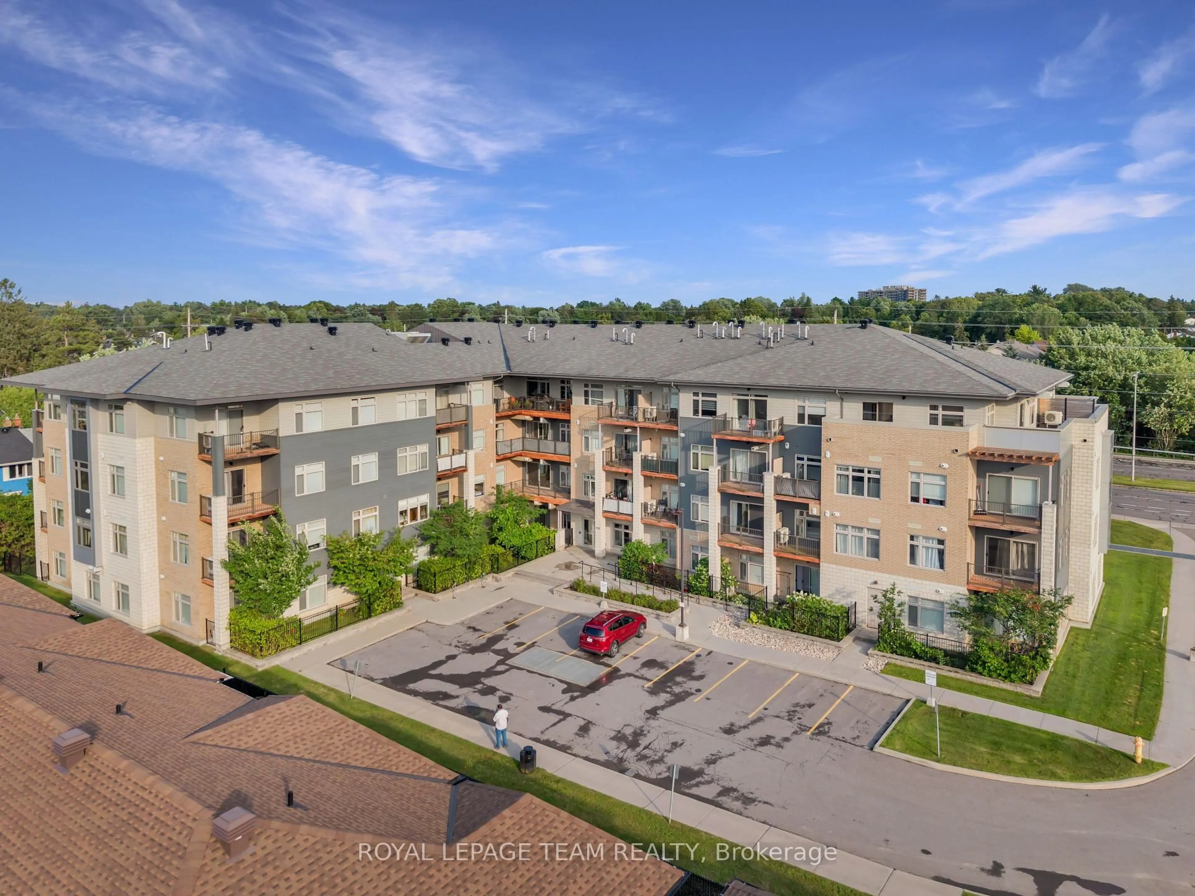 A pic from outside/outdoor area/front of a property/back of a property/a pic from drone, unknown for 2785 Baseline Rd #215, Ottawa Ontario K2H 0B7