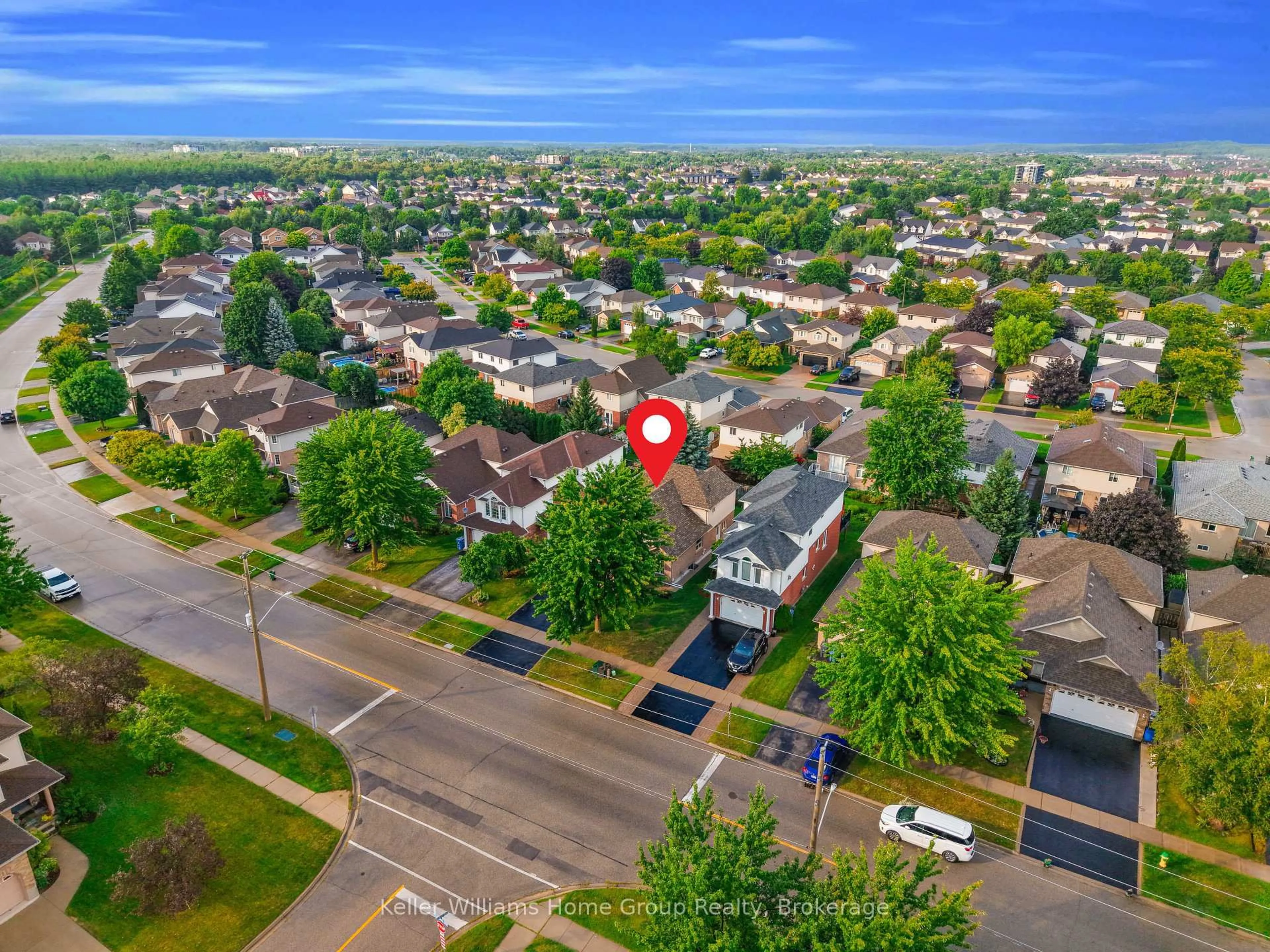 A pic from outside/outdoor area/front of a property/back of a property/a pic from drone, street for 148 Clairfields Dr, Guelph Ontario N1G 5A3