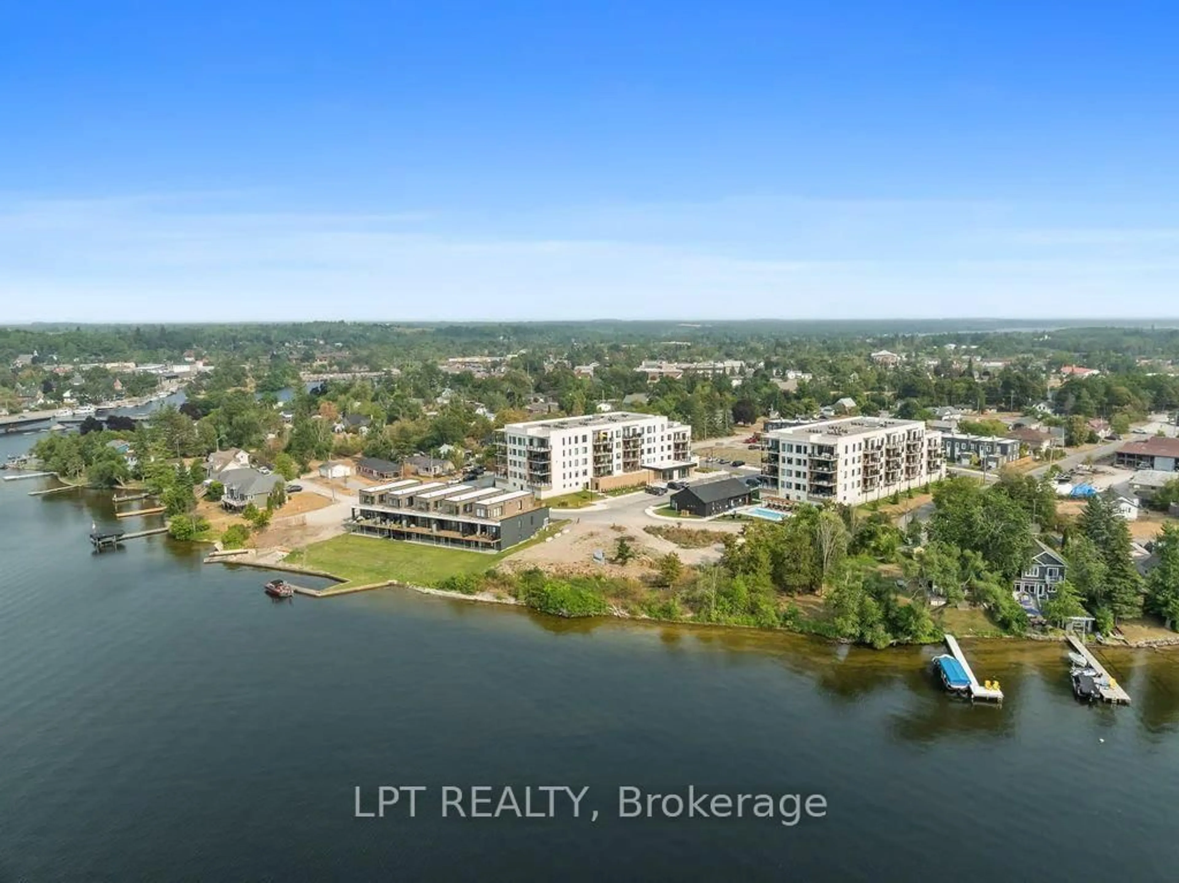 A pic from outside/outdoor area/front of a property/back of a property/a pic from drone, water/lake/river/ocean view for 19B West St #402, Kawartha Lakes Ontario K0M 1N0