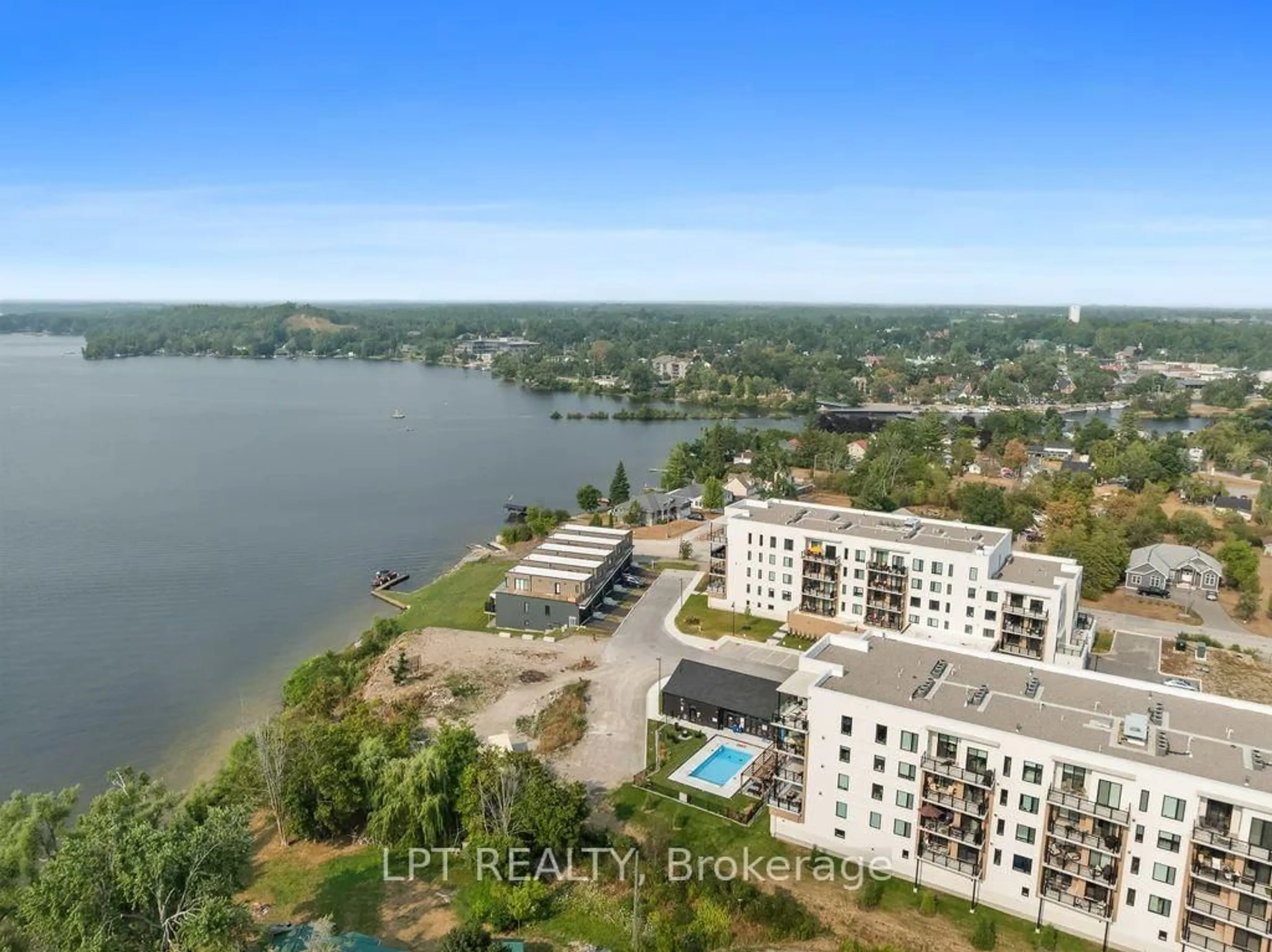 A pic from outside/outdoor area/front of a property/back of a property/a pic from drone, water/lake/river/ocean view for 19B West St #402, Kawartha Lakes Ontario K0M 1N0