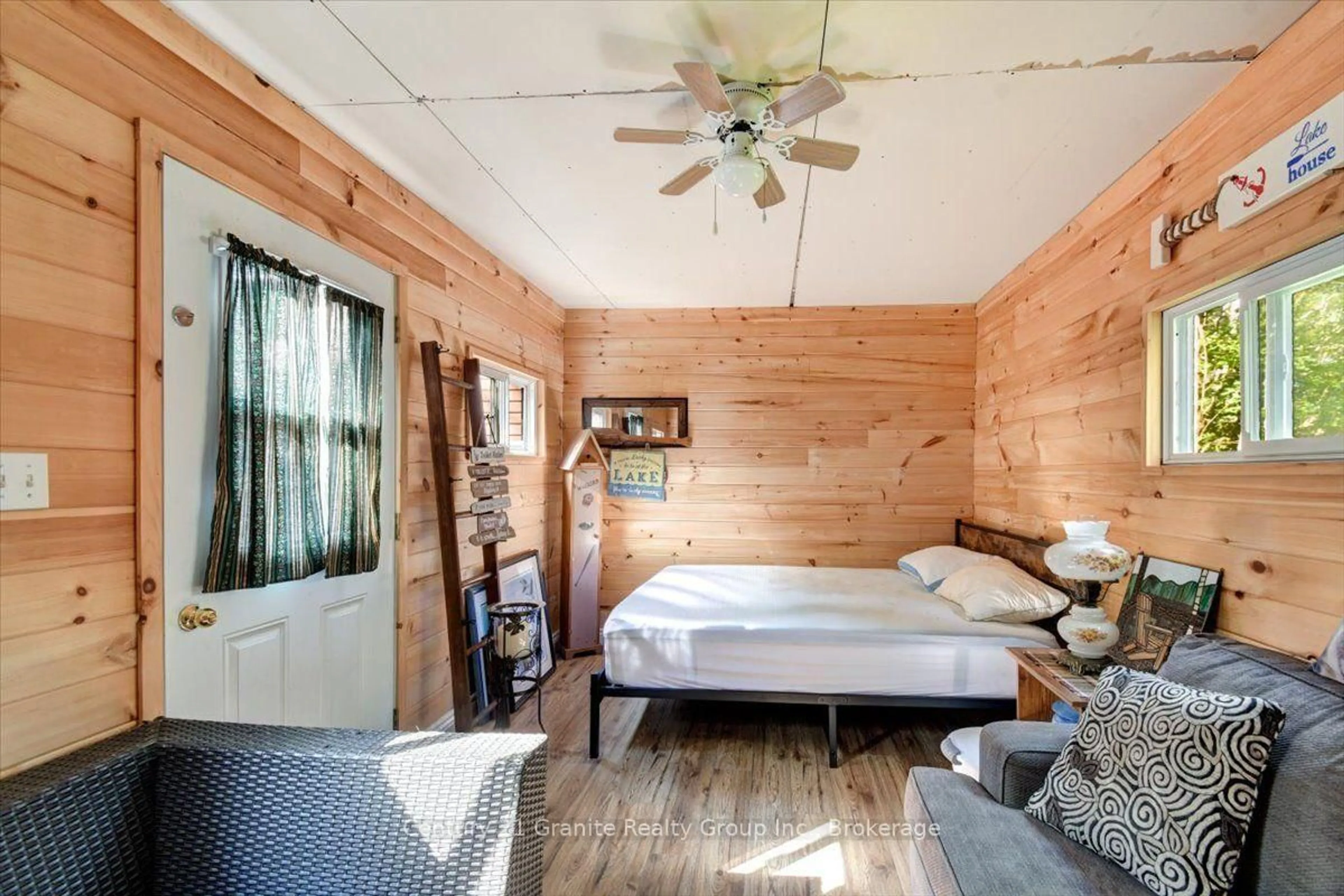 Bedroom with bed, wood/laminate floor for 1144 Trinity Rd, Highlands East Ontario K0L 2A0