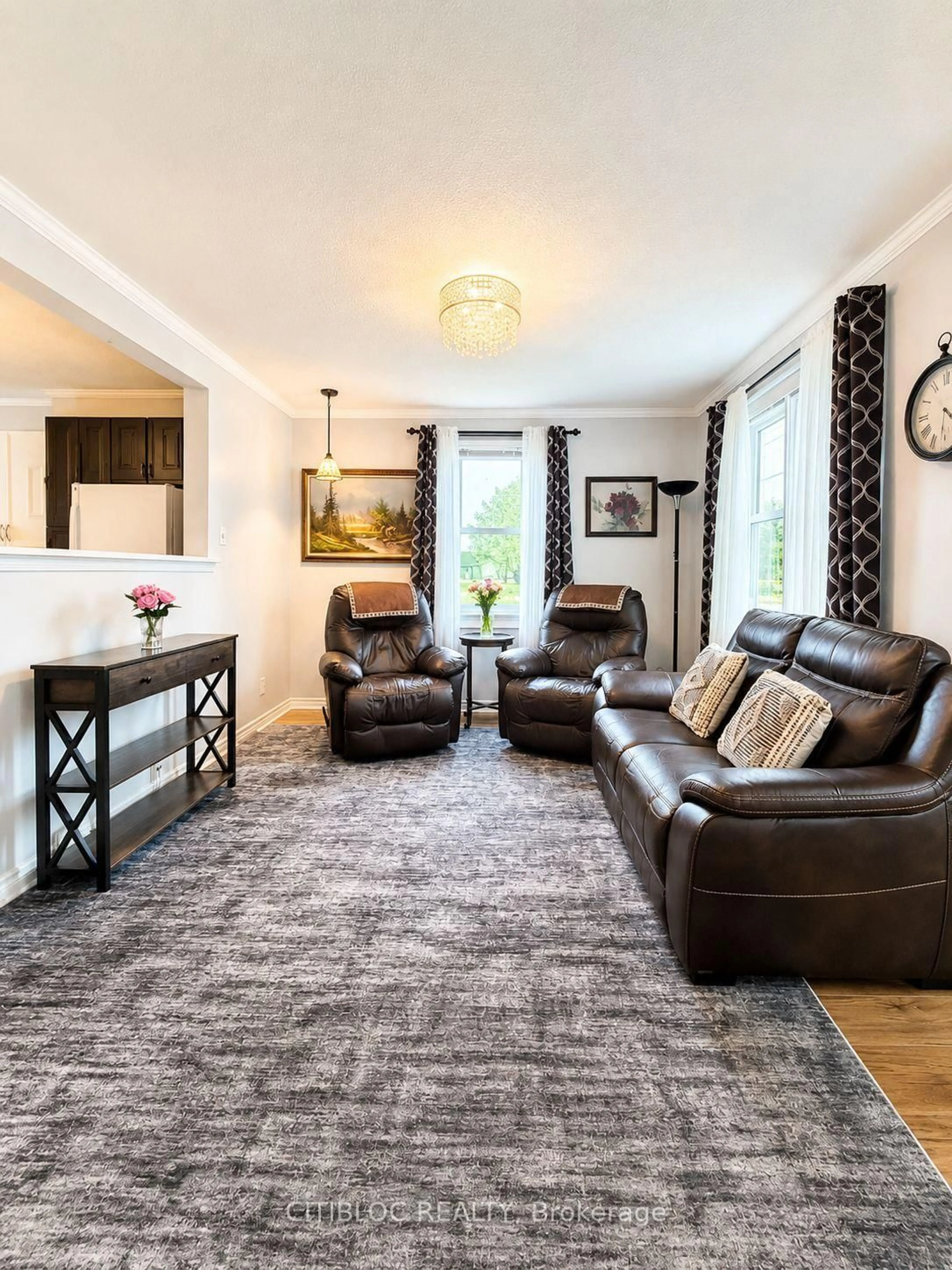 Living room with furniture, carpet floor for 67 Ottawa Ave, South River Ontario P0A 1X0