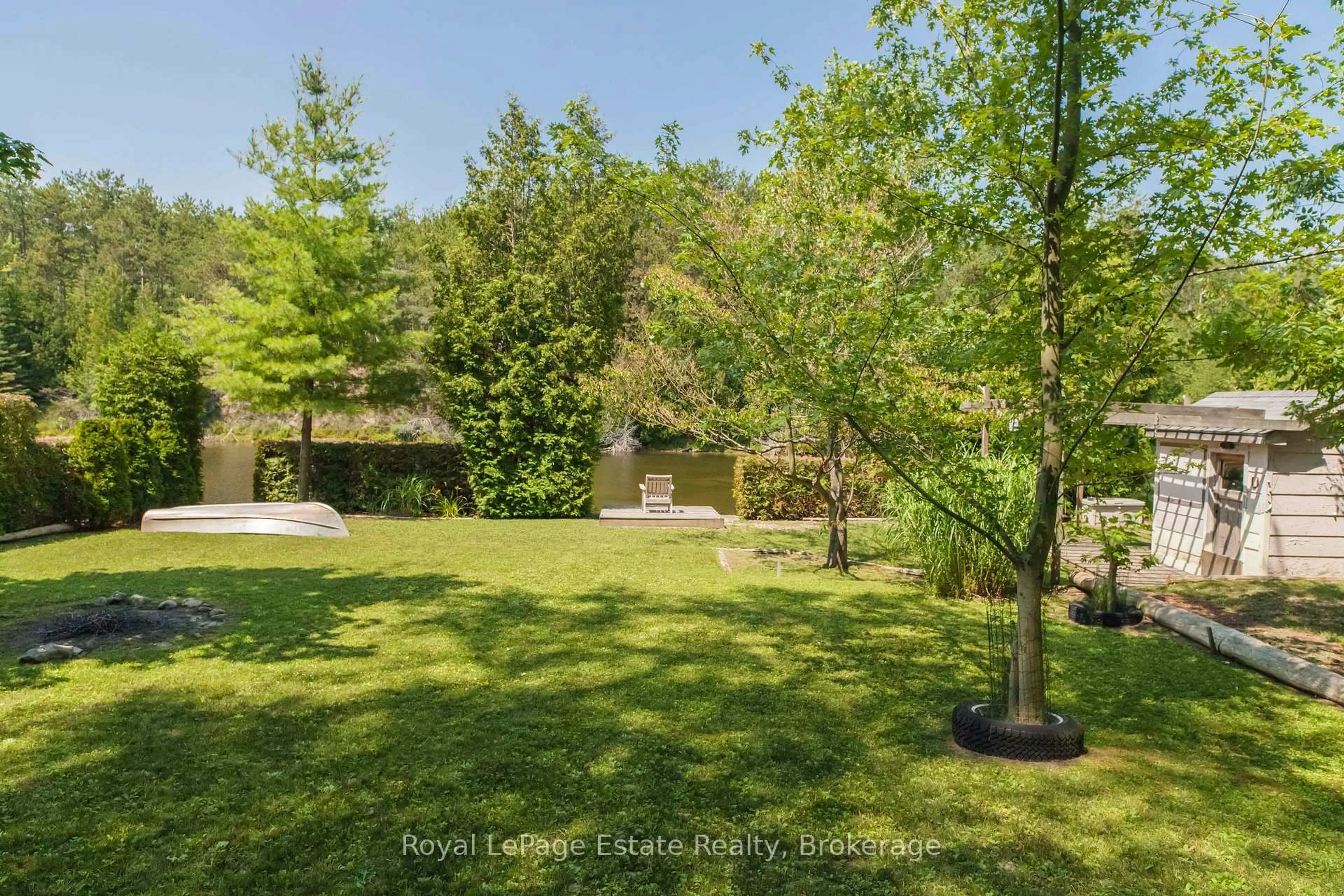 A pic from outside/outdoor area/front of a property/back of a property/a pic from drone, forest/trees view for 20 Cammidge Cres, South Bruce Peninsula Ontario N0H 2G0