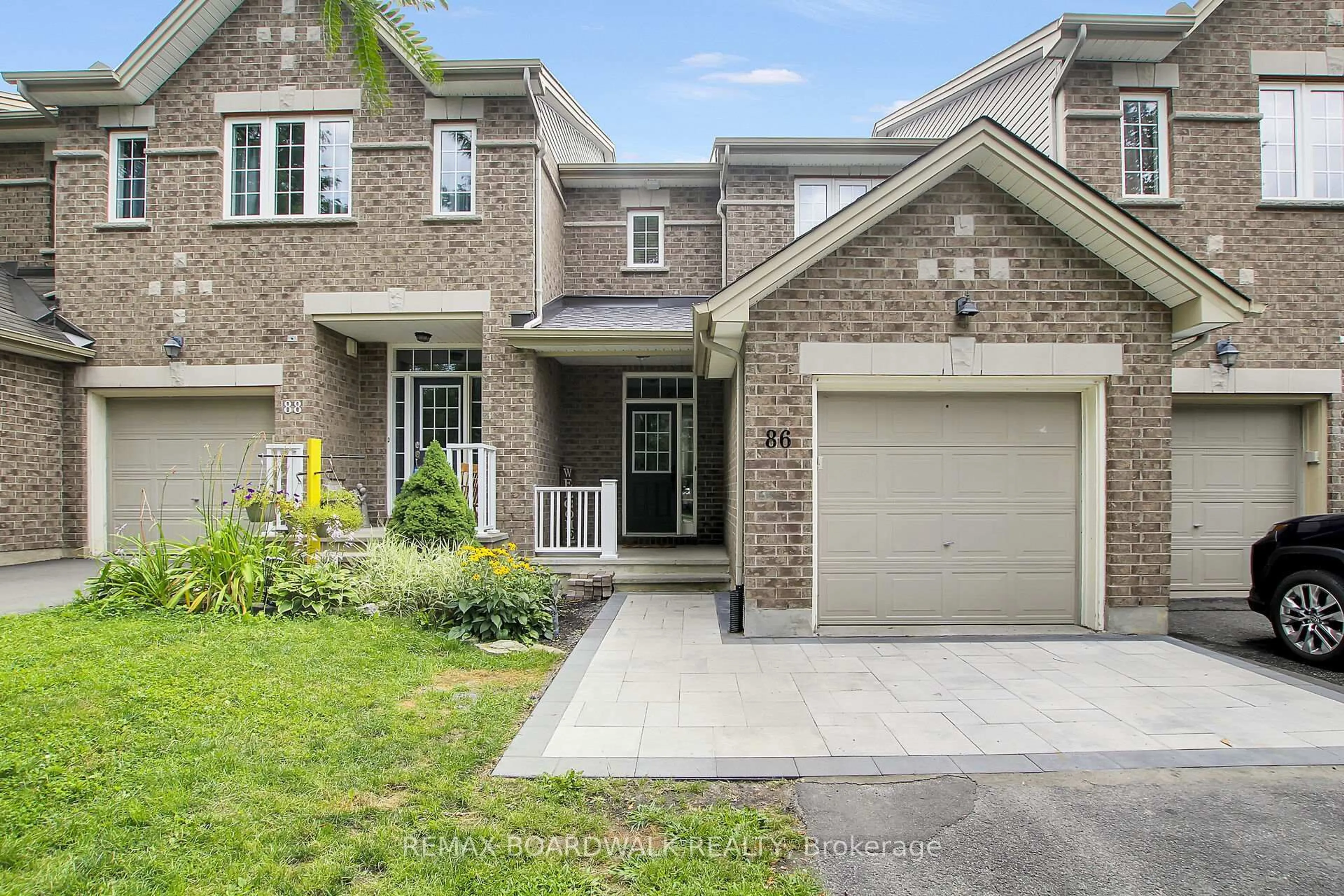 Home with brick exterior material, street for 86 Saddlesmith Circ, Ottawa Ontario K2M 2Y5
