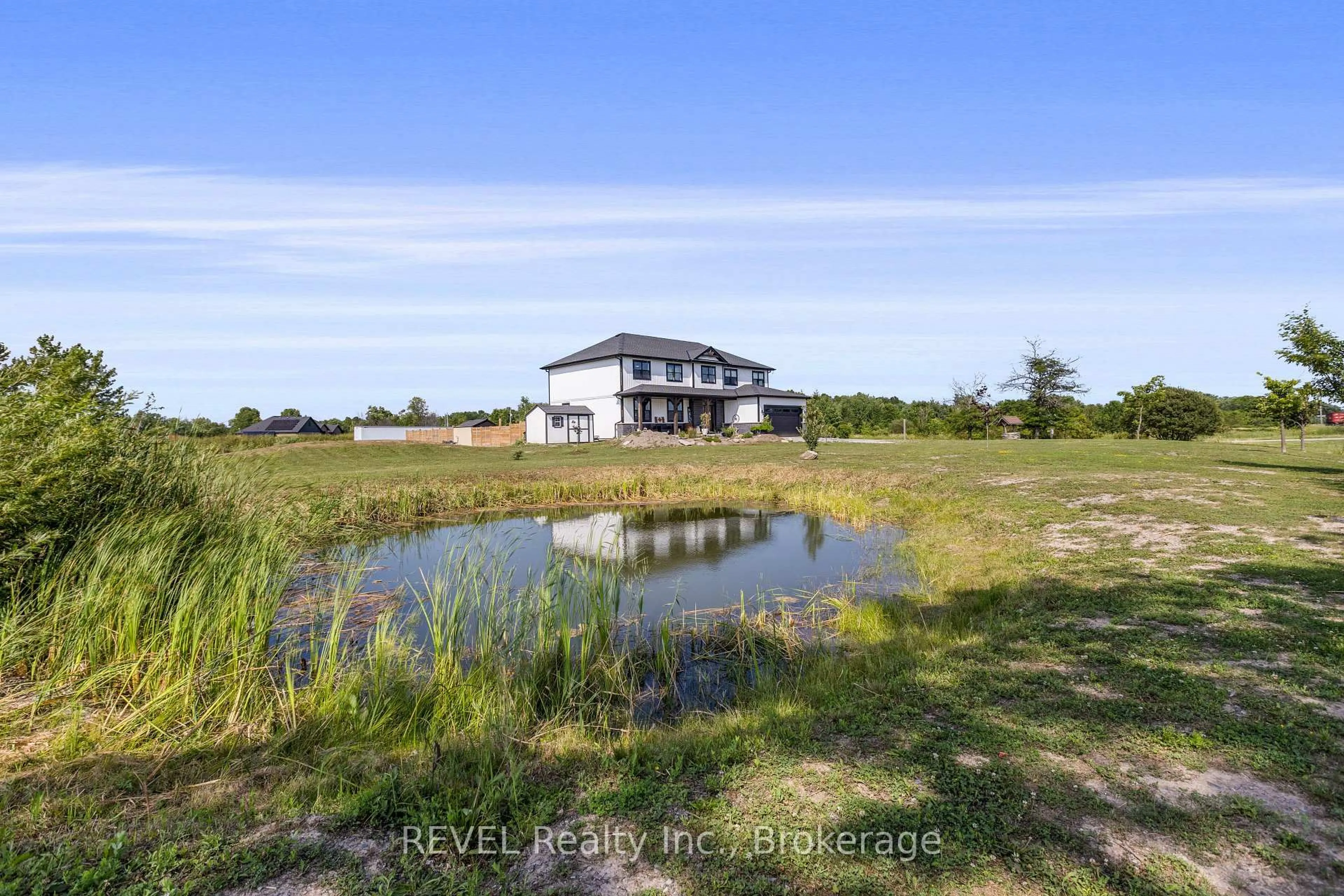 A pic from outside/outdoor area/front of a property/back of a property/a pic from drone, water/lake/river/ocean view for 50802 O'Reilly's Rd, Wainfleet Ontario L0S 1V0