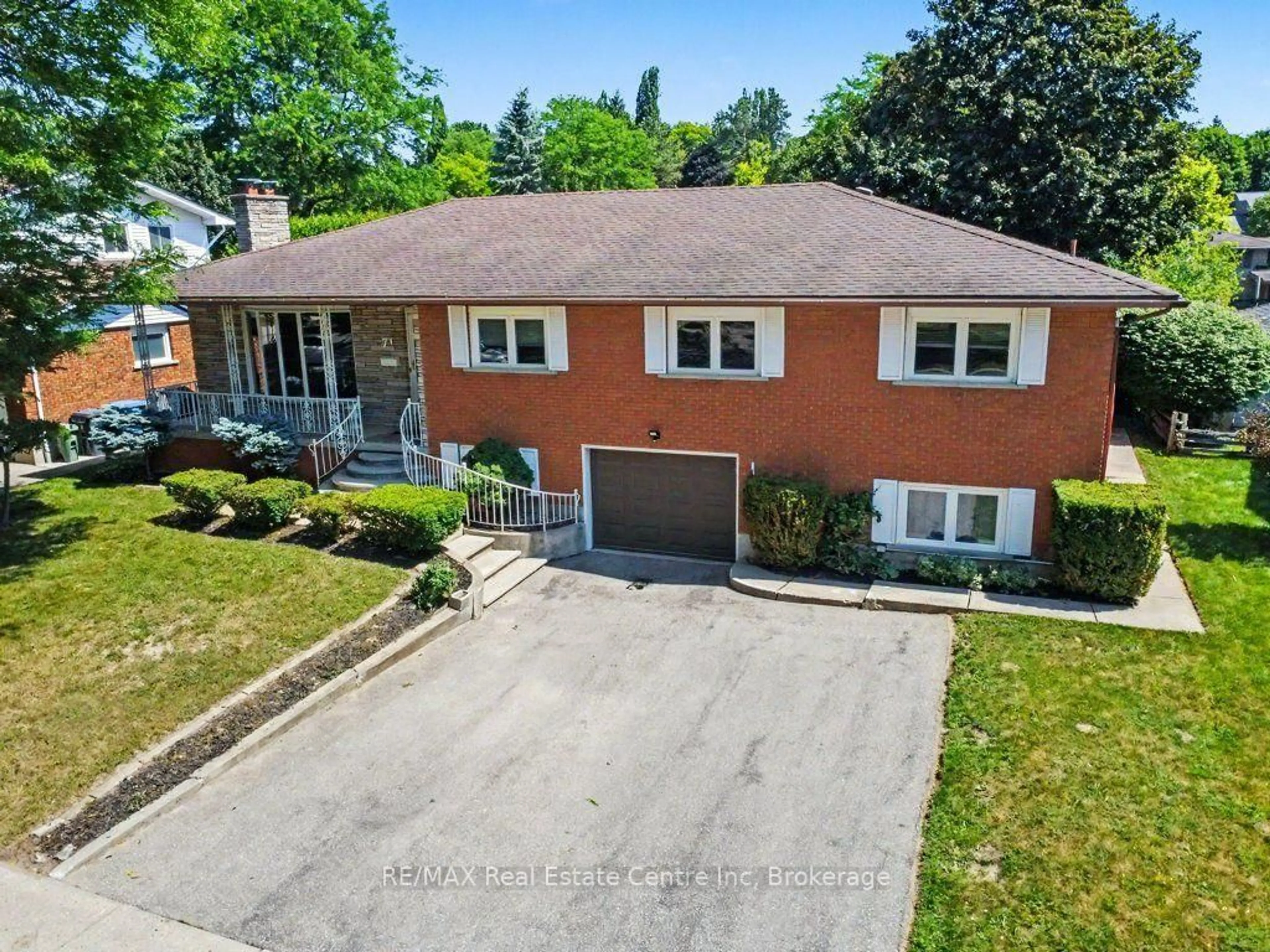 A pic from outside/outdoor area/front of a property/back of a property/a pic from drone, street for 71 Renfield St, Guelph Ontario N1E 4A3