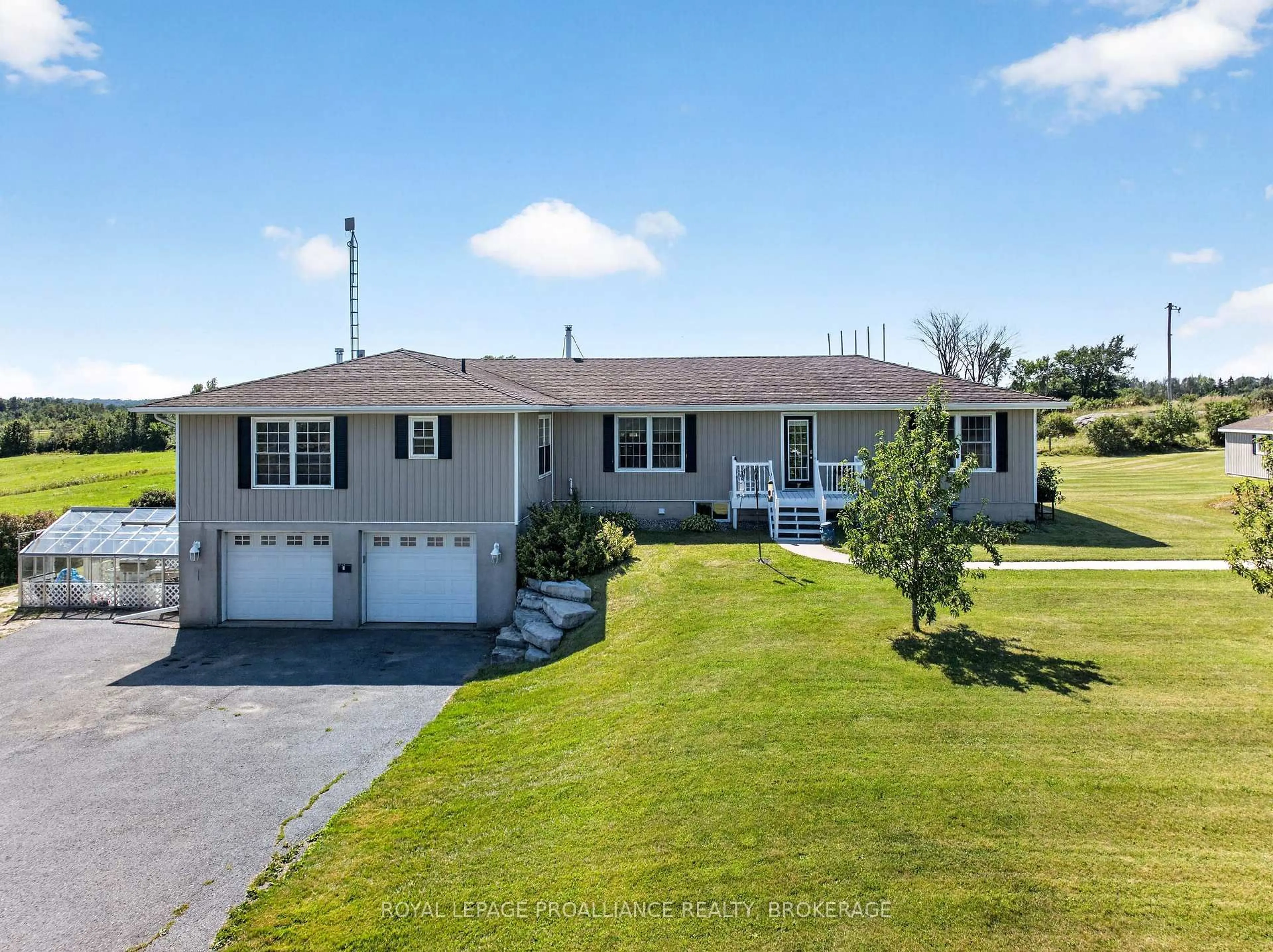 A pic from outside/outdoor area/front of a property/back of a property/a pic from drone, water/lake/river/ocean view for 2270 Hitchcock Rd, Wolfe Island Ontario K0H 2Y0