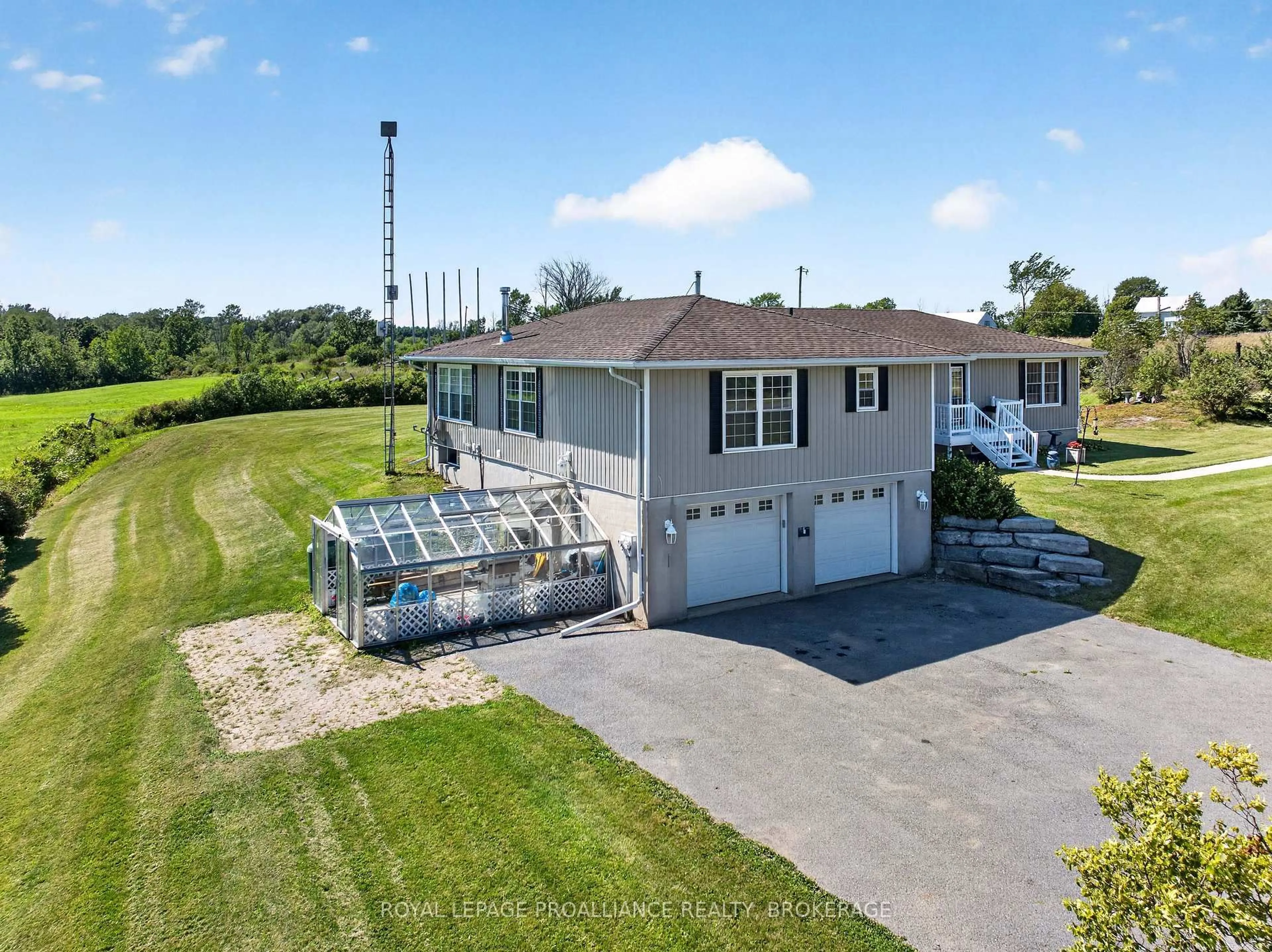 A pic from outside/outdoor area/front of a property/back of a property/a pic from drone, water/lake/river/ocean view for 2270 Hitchcock Rd, Wolfe Island Ontario K0H 2Y0