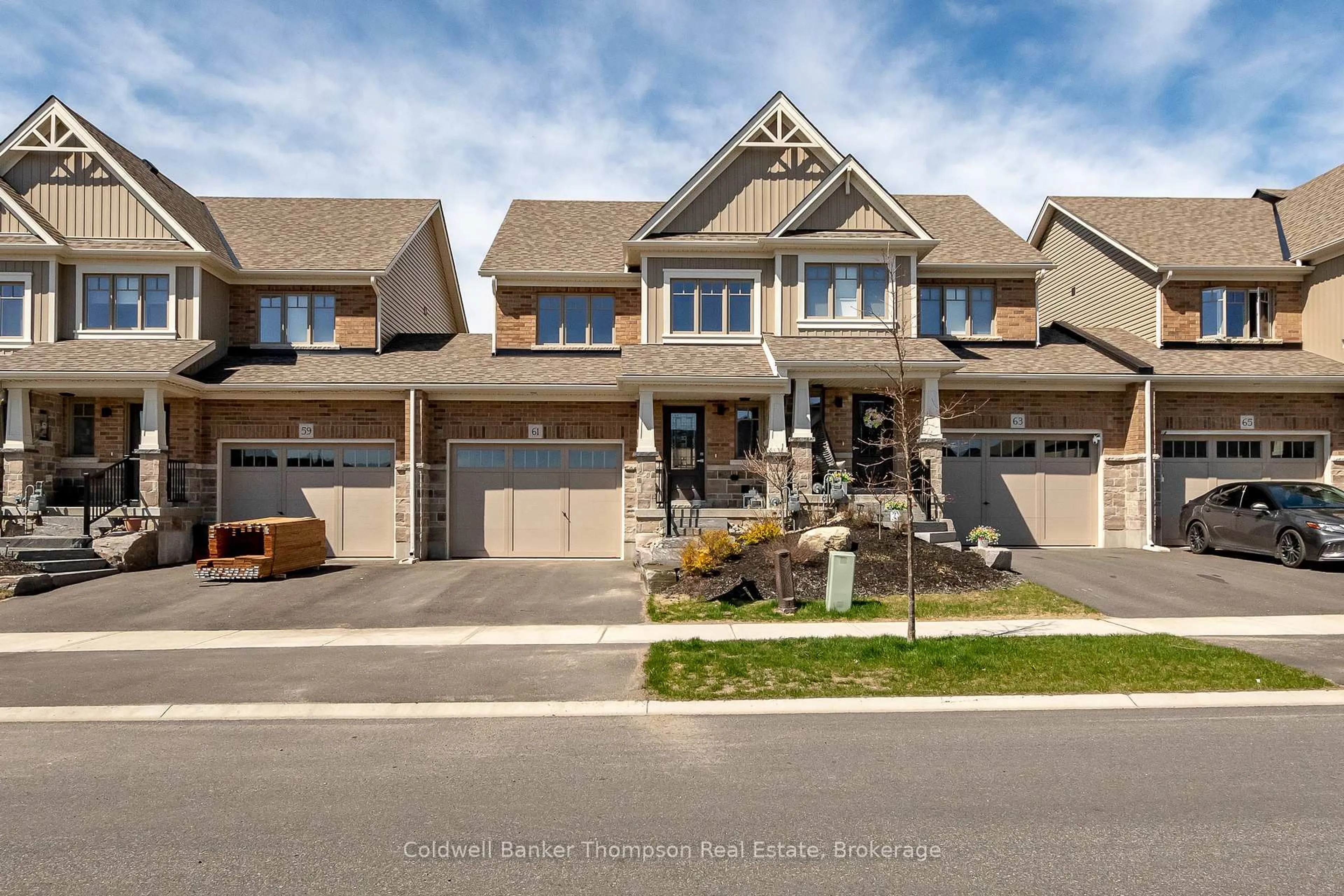 Home with brick exterior material, street for 61 Charles Morley Blvd, Huntsville Ontario P1H 0G5