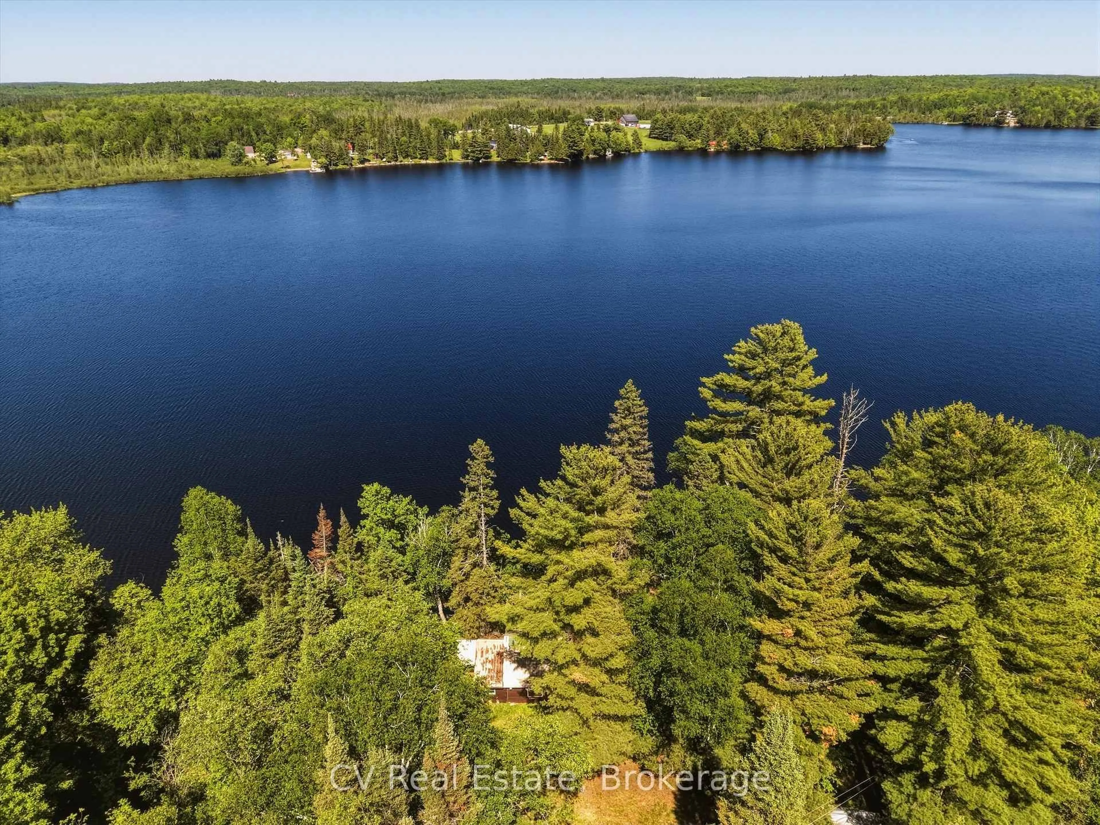 A pic from outside/outdoor area/front of a property/back of a property/a pic from drone, water/lake/river/ocean view for 109 Black Bear Rd, Magnetawan Ontario P0A 1P0