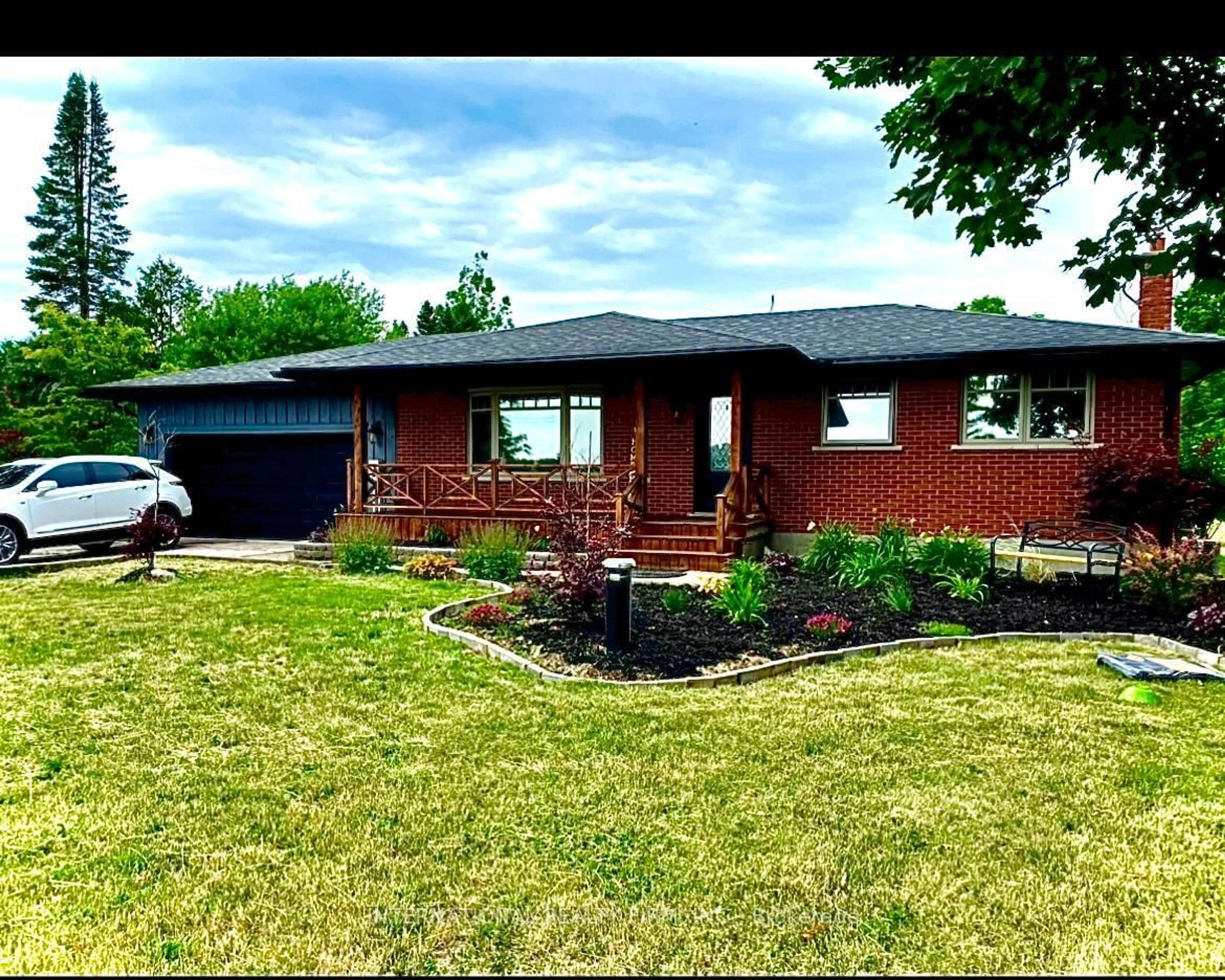 Home with brick exterior material, street for 9364 Wellington Rd 124, Erin Ontario N0B 1T0