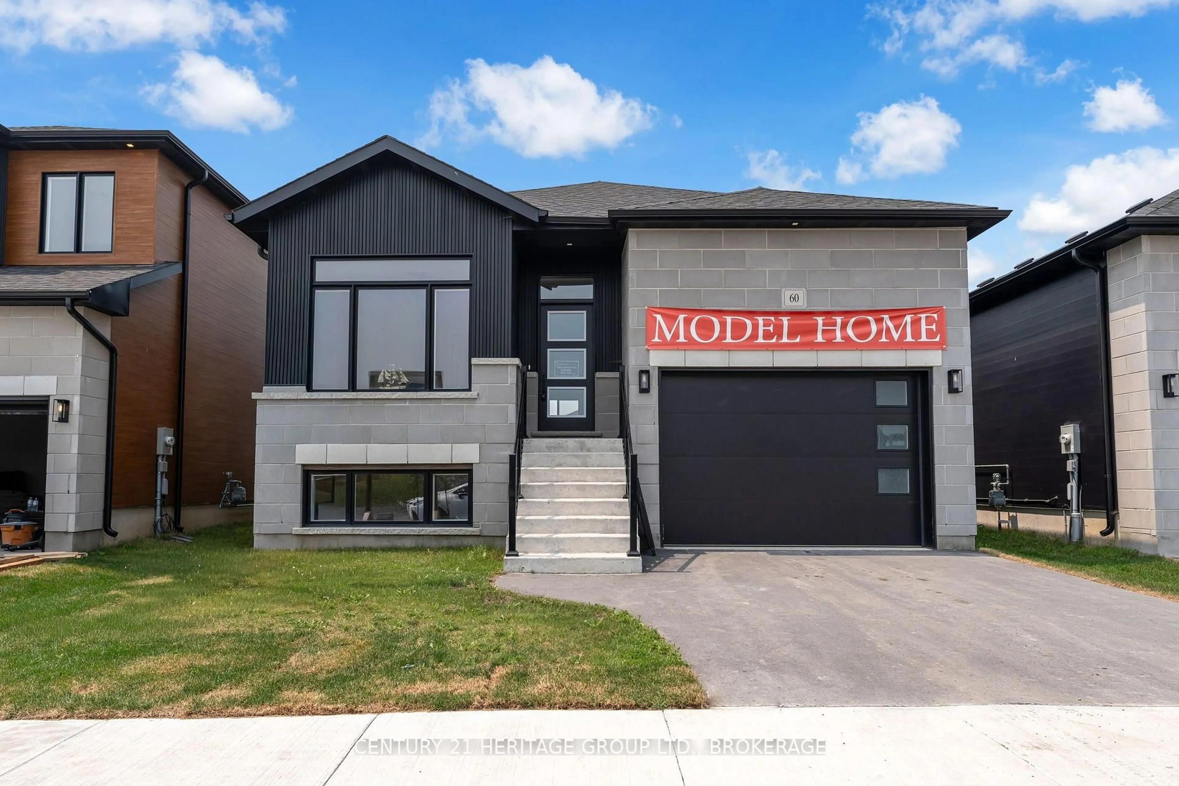 Home with vinyl exterior material, street for 60 Dusenbury Dr, Bissett Creek Ontario K0H 2H0