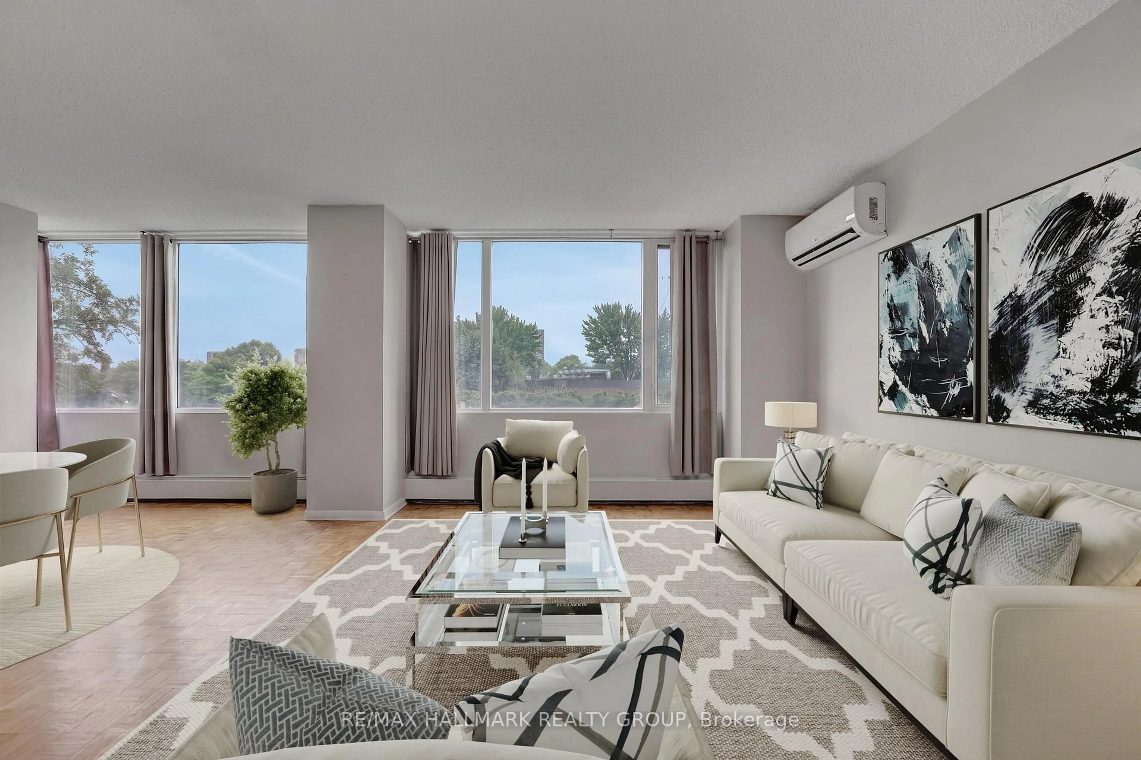 Living room with furniture, carpet floor for 2625 Regina St #110, Ottawa Ontario K2B 5W8