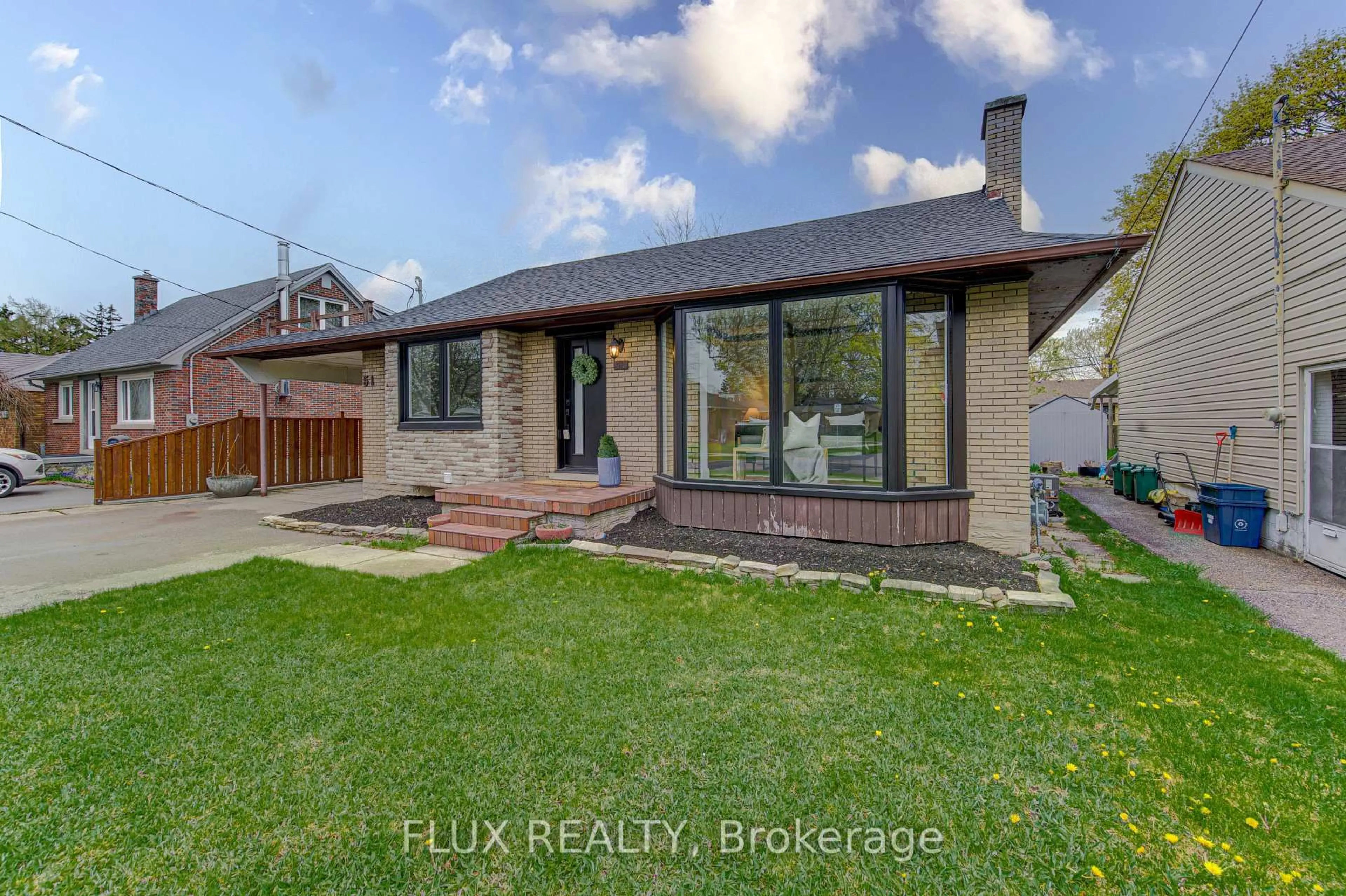 Home with brick exterior material, street for 51 Rosemount Dr, Kitchener Ontario N2B 1P9