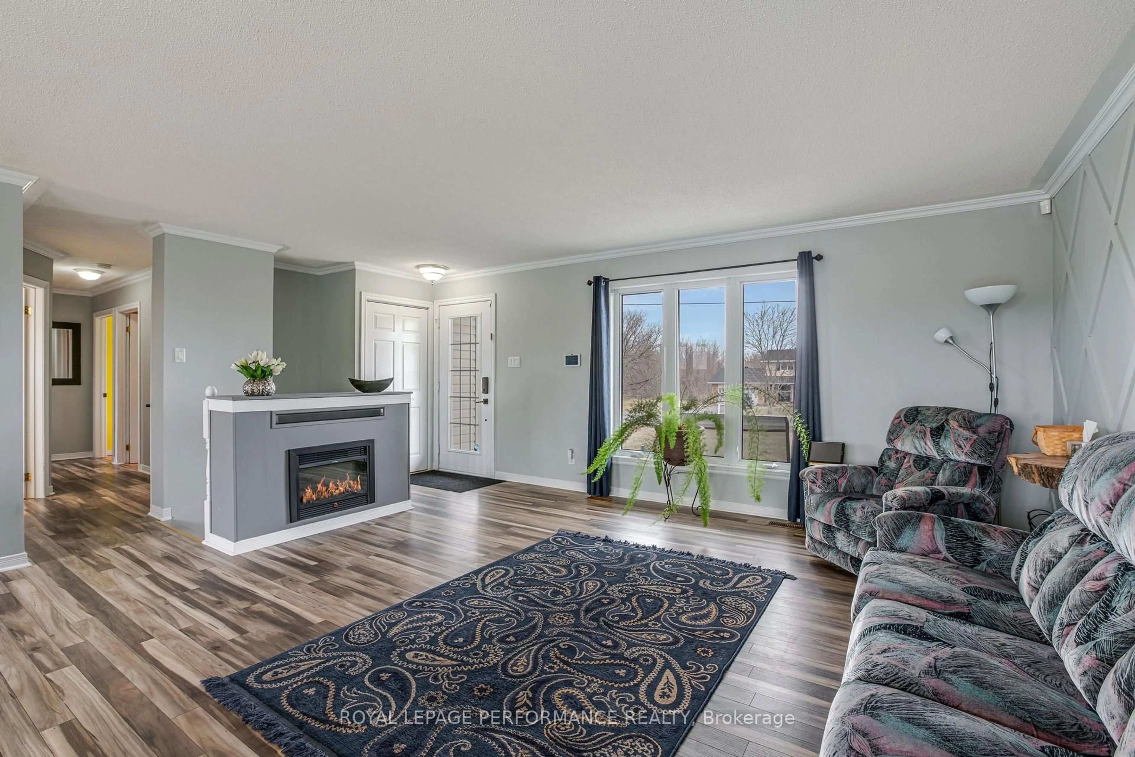Living room with furniture, wood/laminate floor for 1890 cassburn Rd, Champlain Ontario K0B 1K0