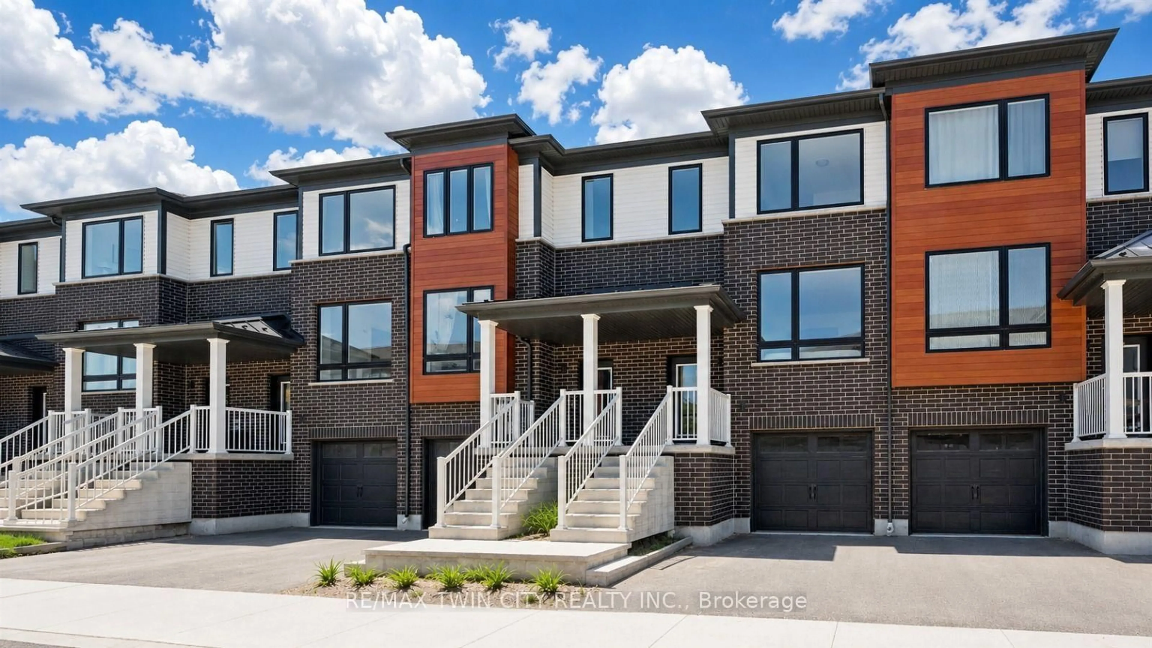 Home with brick exterior material, street for 14 Sora Lane, Guelph Ontario N1E 0T4