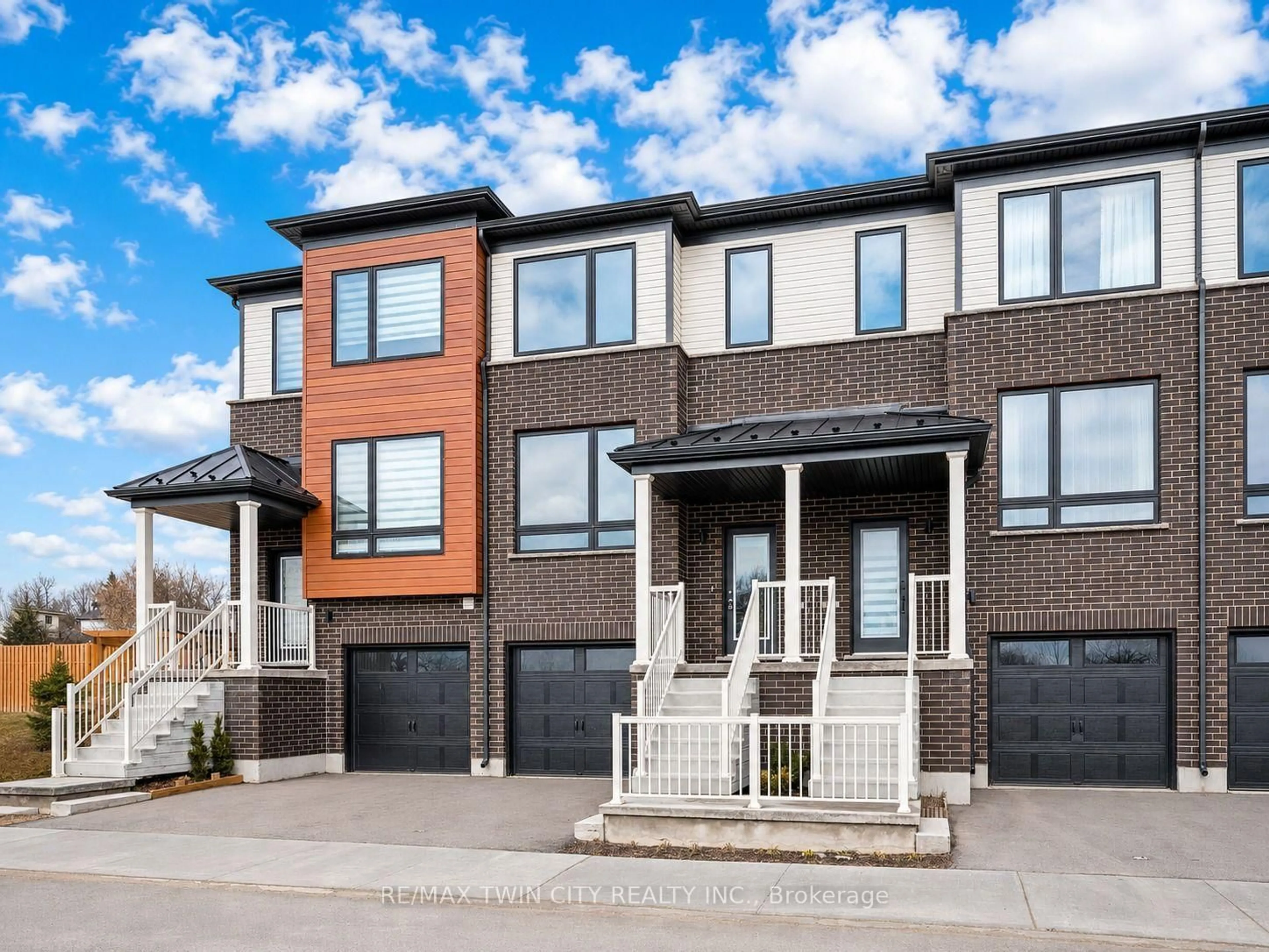 Home with brick exterior material, street for 27 SORA Lane, Guelph Ontario N1E 0T4