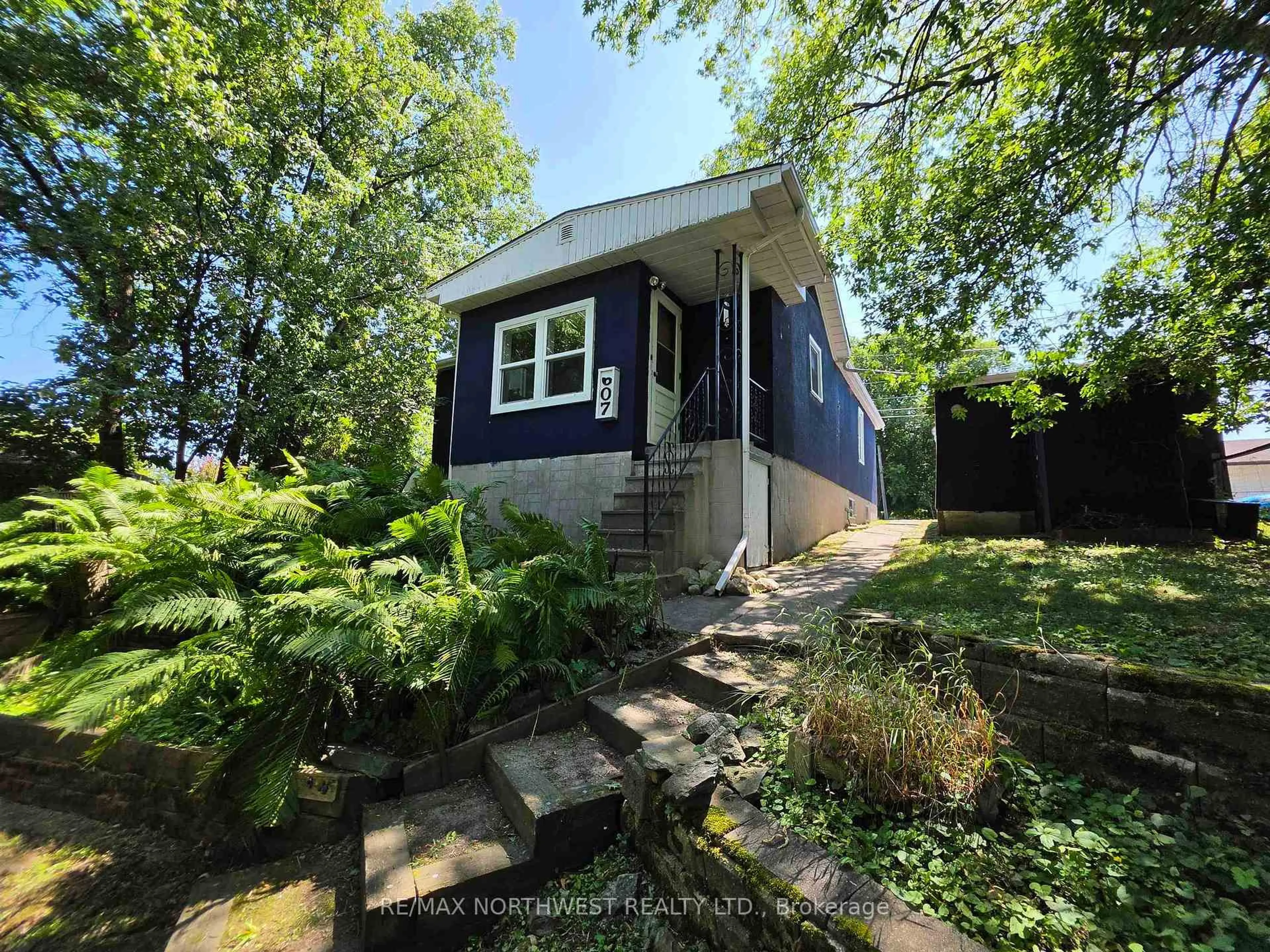 A pic from outside/outdoor area/front of a property/back of a property/a pic from drone, street for 607 First Street South, Kenora Ontario P9N 1E1