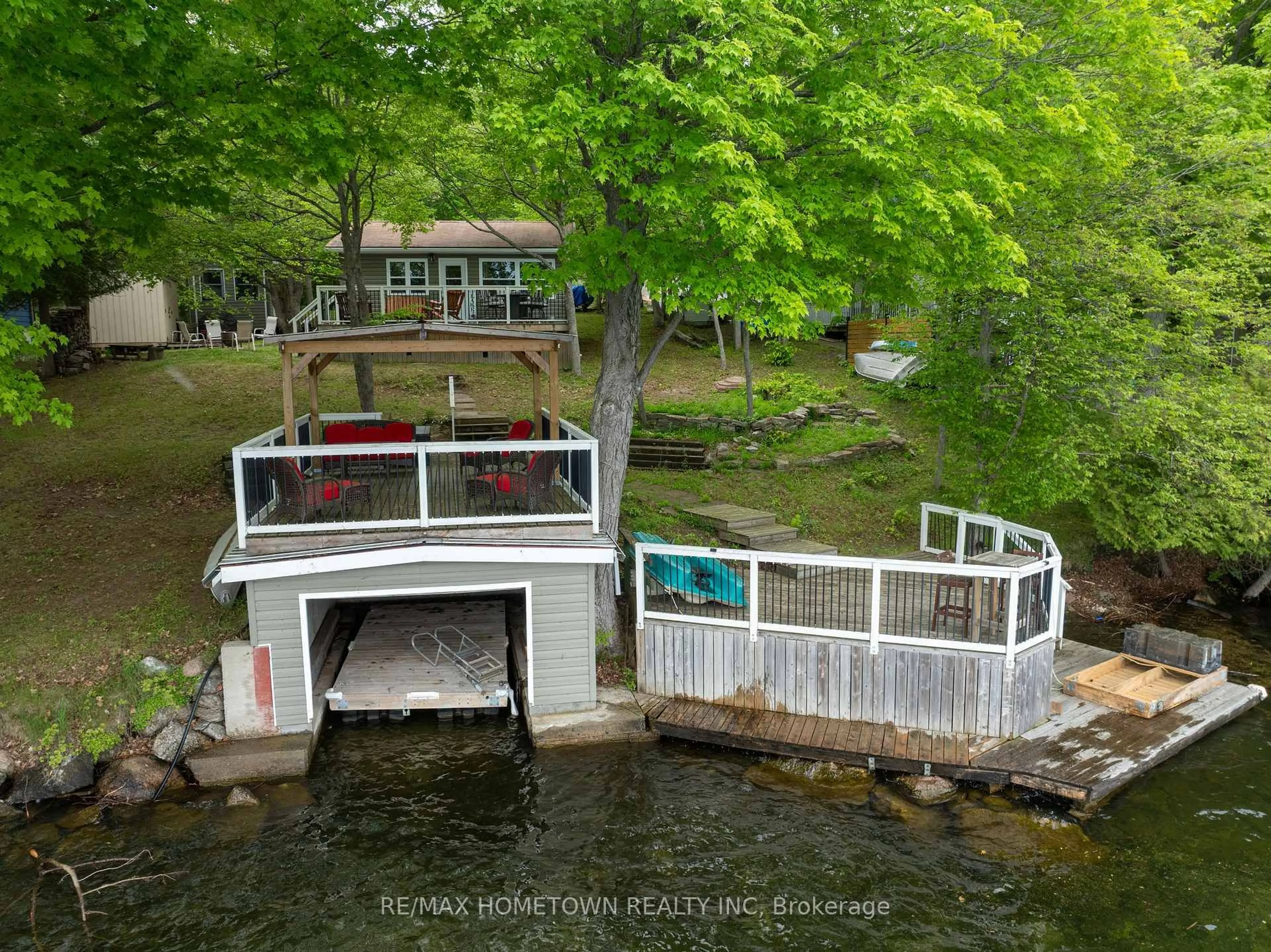 A pic from outside/outdoor area/front of a property/back of a property/a pic from drone, water/lake/river/ocean view for 66 SCOTT Lane, Rideau Lakes Ontario K0G 1V0
