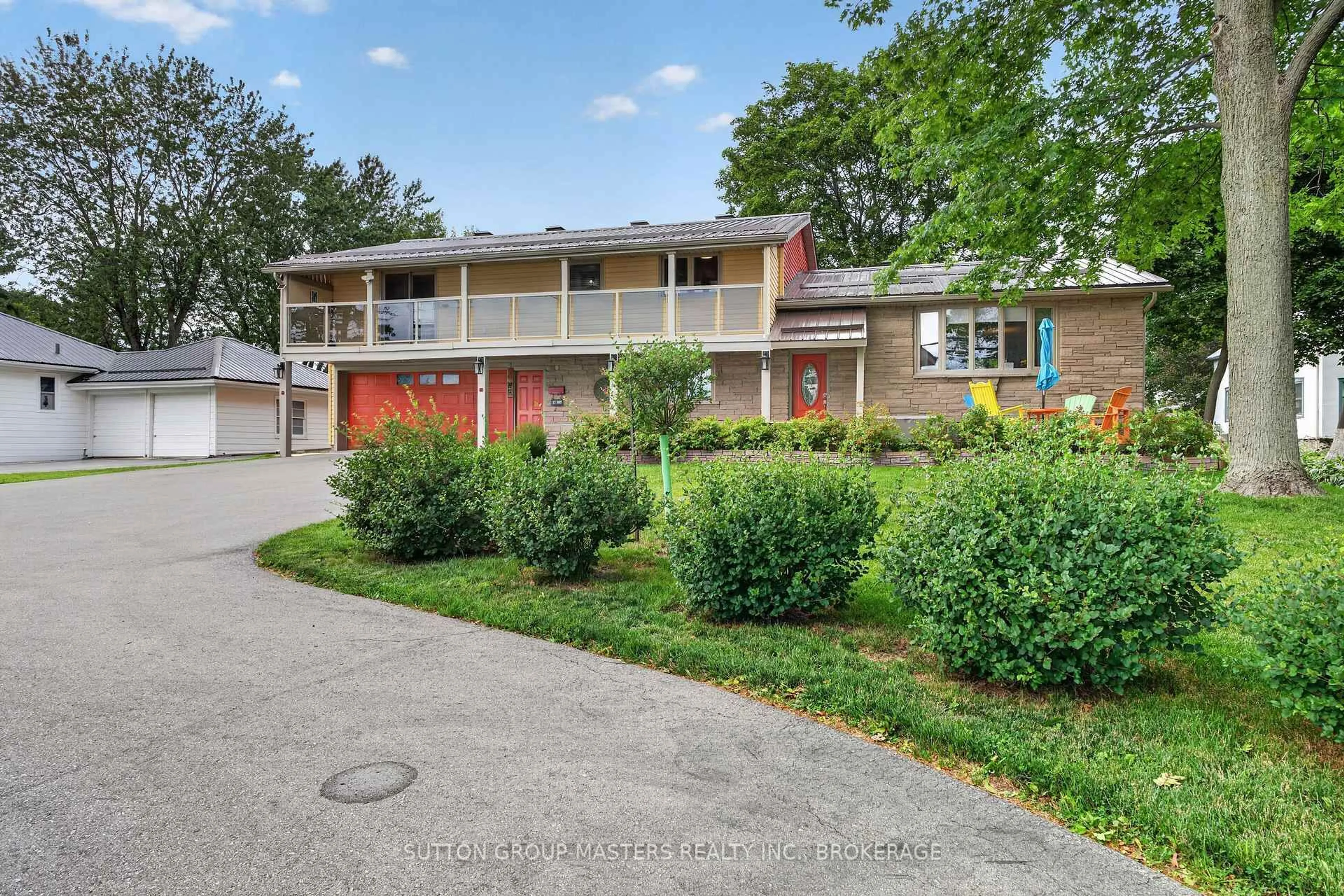 A pic from outside/outdoor area/front of a property/back of a property/a pic from drone, street for 4415 Bath Rd, Loyalist Ontario K7N 1A1