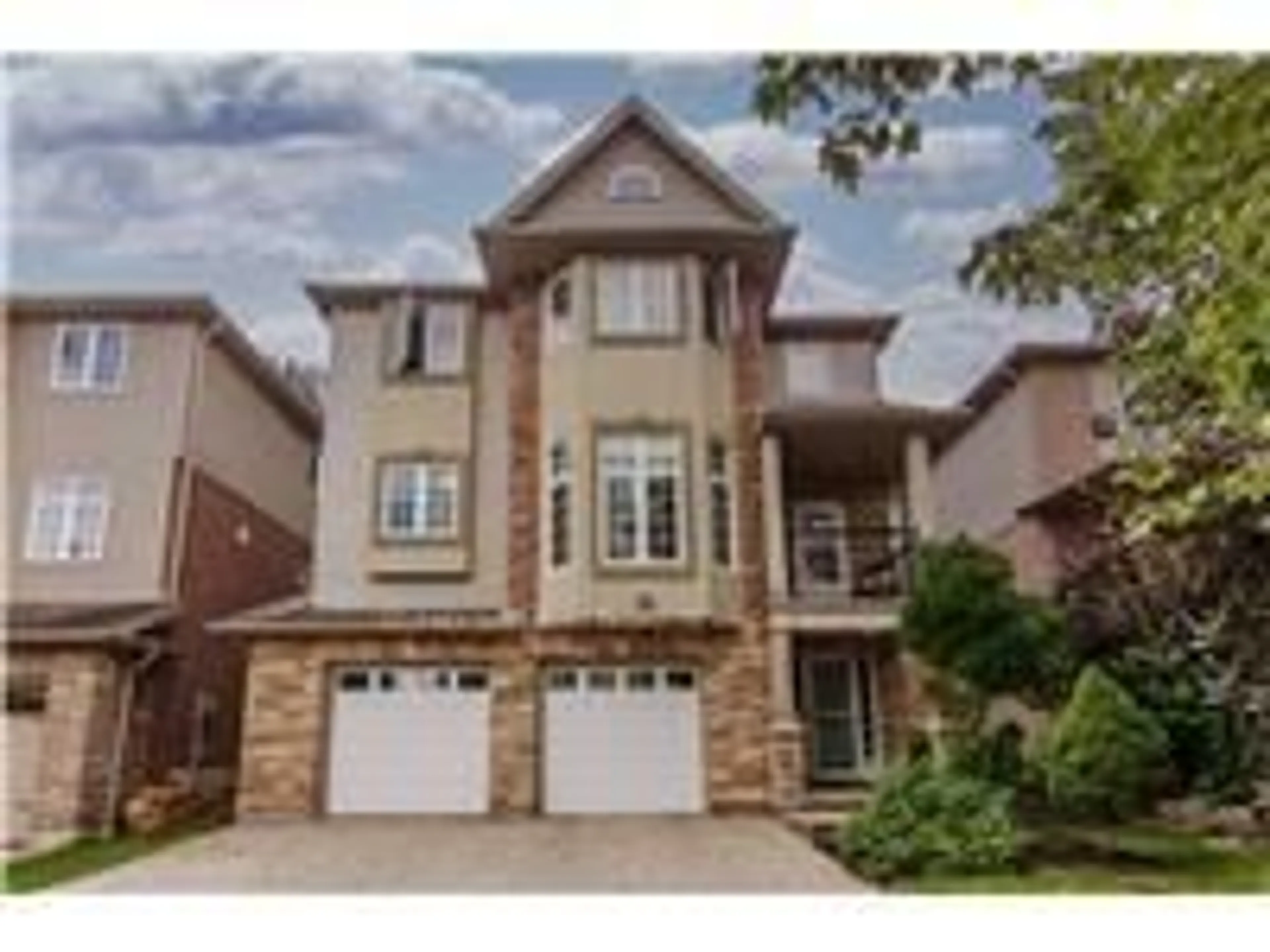 Home with brick exterior material, street for 563 Woolgrass Ave, Waterloo Ontario N2V 2Y2