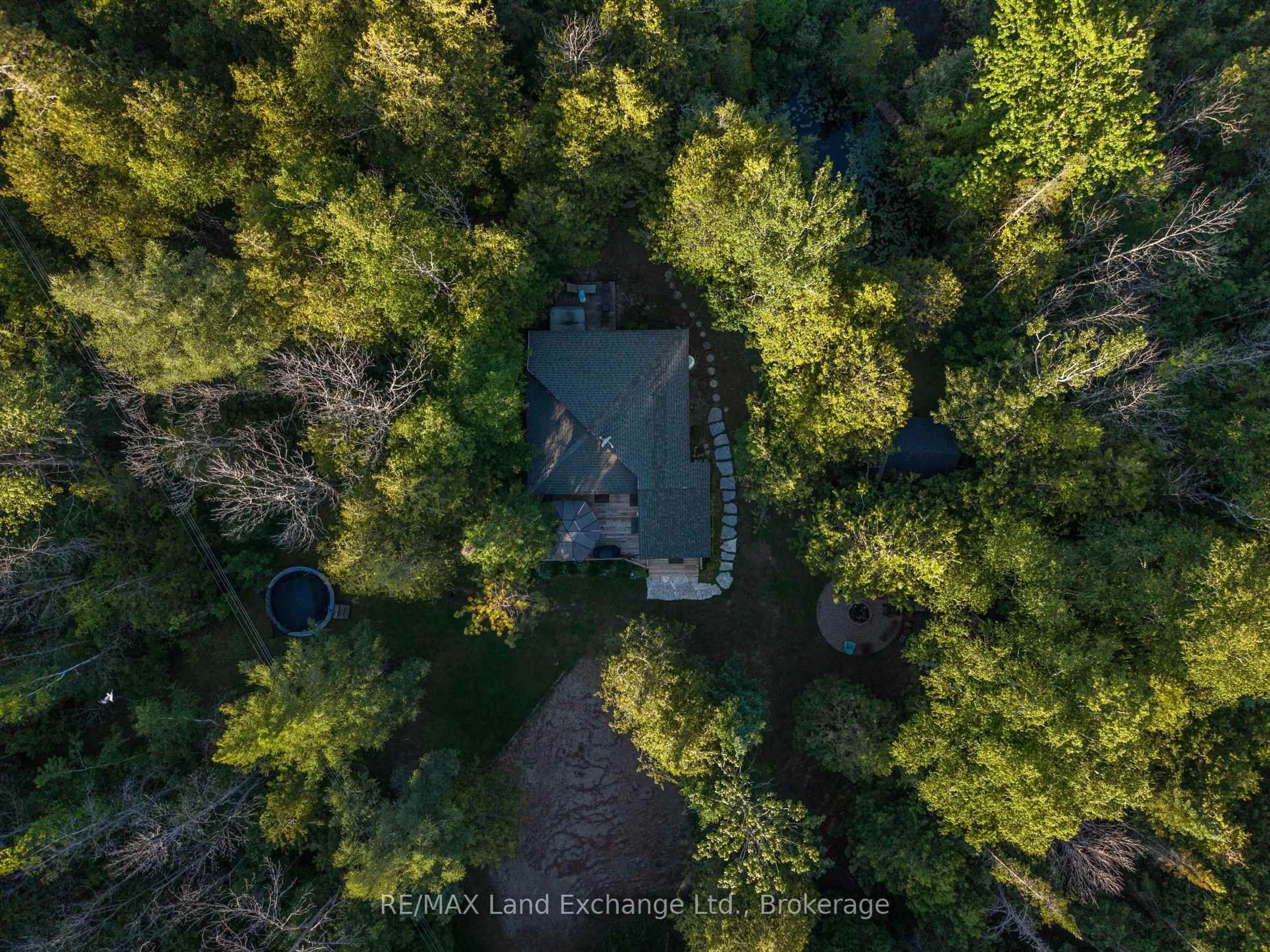 A pic from outside/outdoor area/front of a property/back of a property/a pic from drone, forest/trees view for 18 Hicks Lane, Kincardine Ontario N0G 2T0