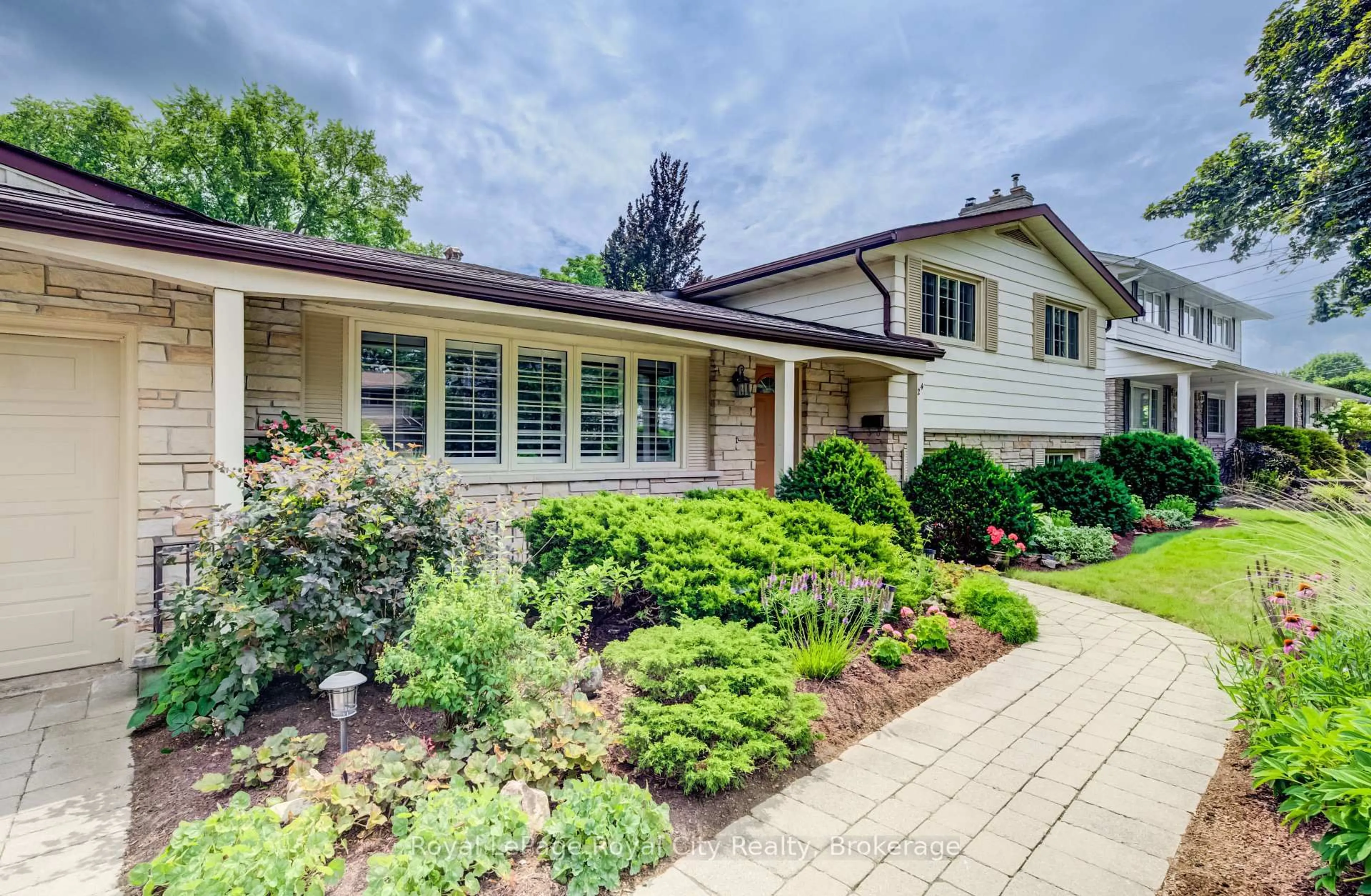 Home with brick exterior material, street for 24 Maplewood Dr, Guelph Ontario N1G 1L8