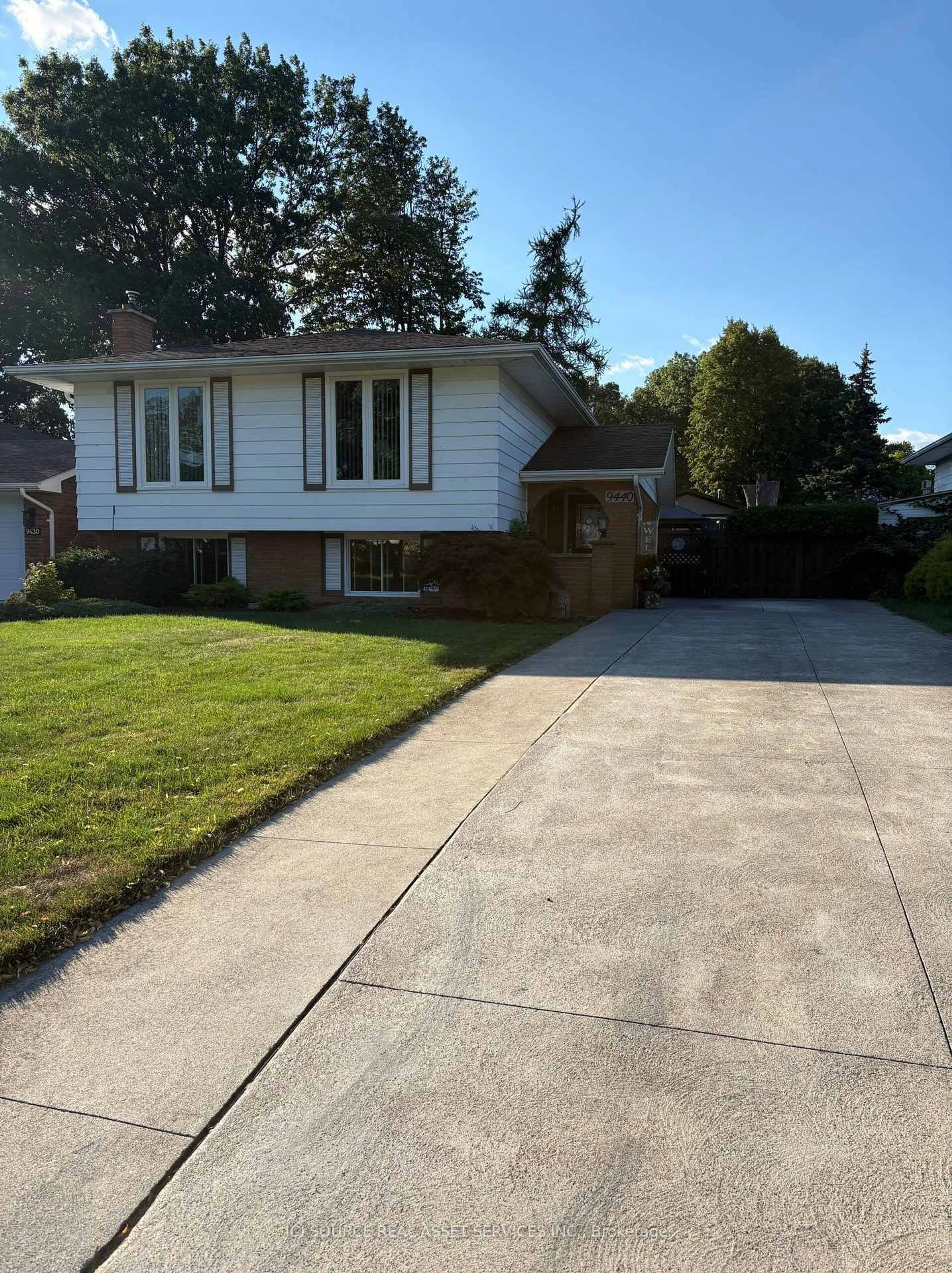 Home with vinyl exterior material, street for 9440 Chestnut Dr, Windsor Ontario N8R 1G8