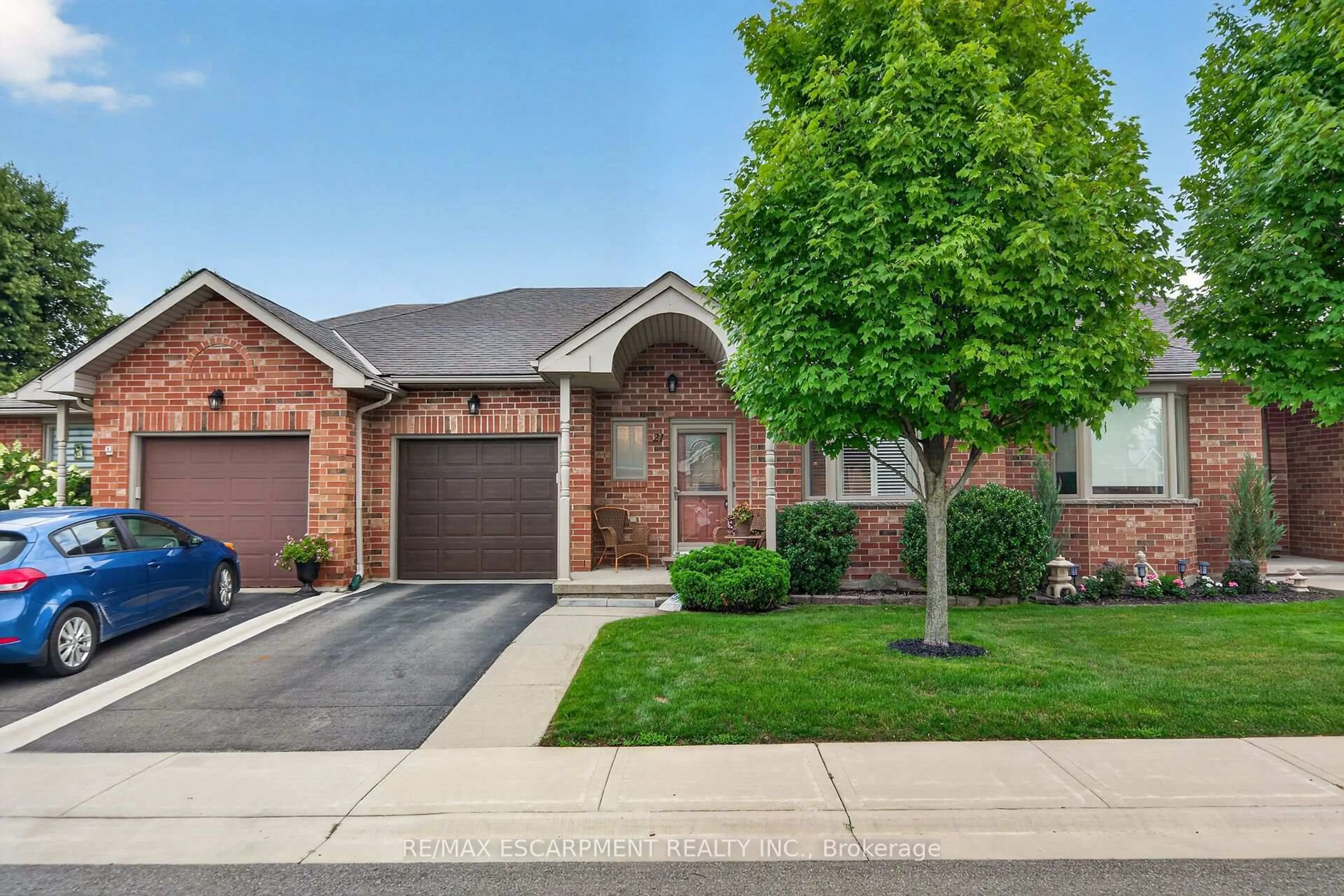 Home with brick exterior material, street for 21 TWENTYPLACE Blvd, Hamilton Ontario L0R 1W0