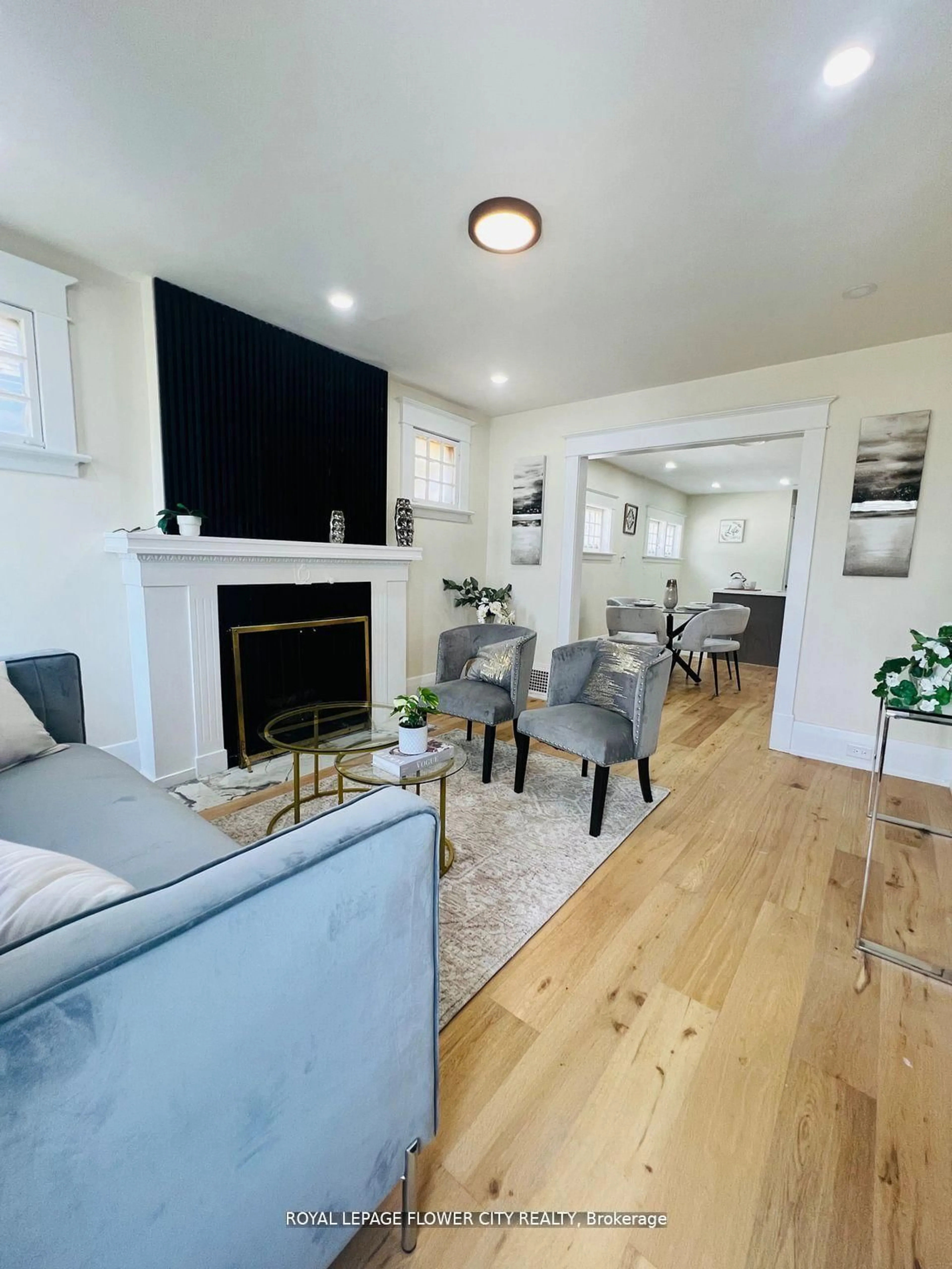 Living room with furniture, wood/laminate floor for 346 Wharncliffe Rd, London South Ontario N6J 2L8
