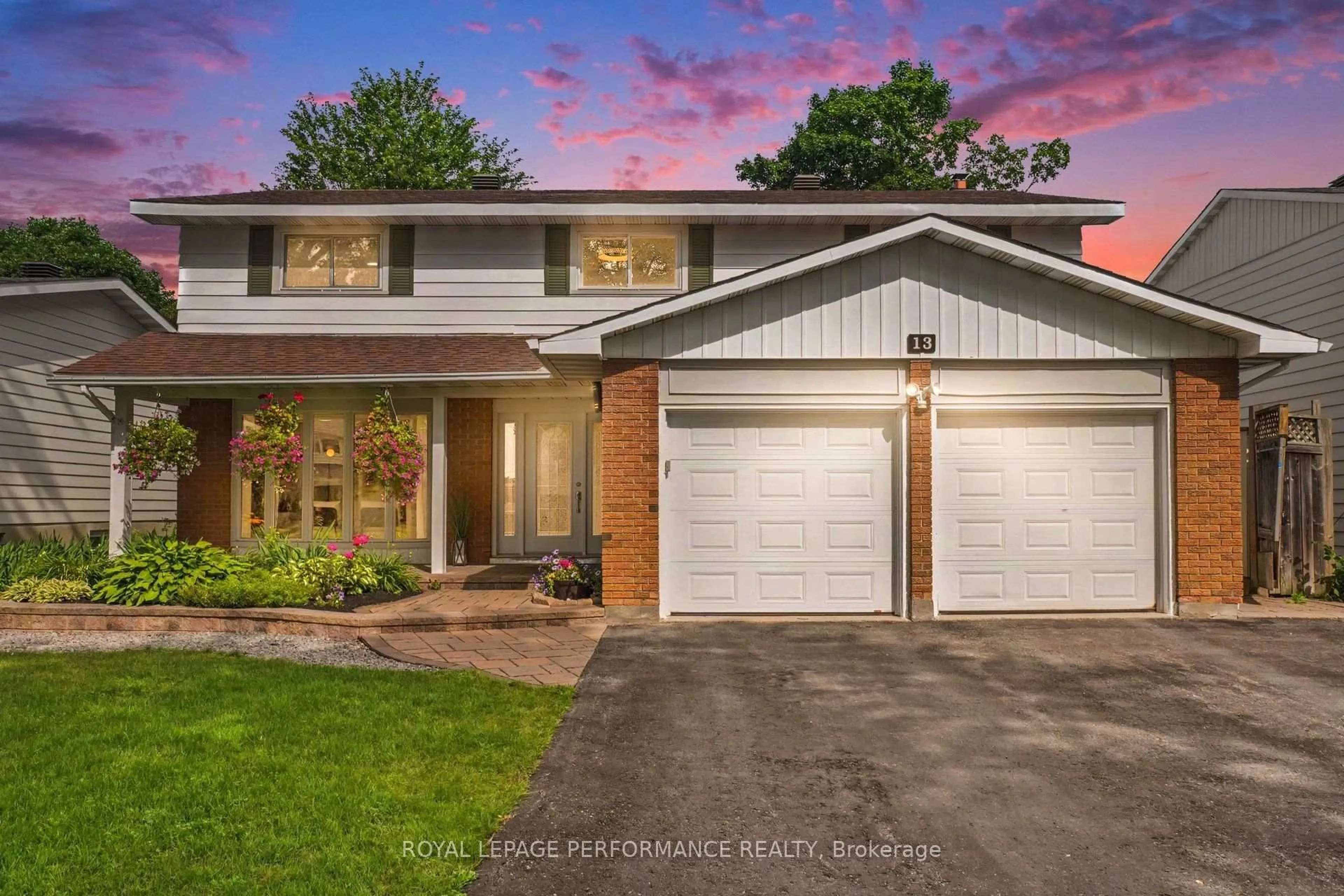 Home with brick exterior material, street for 13 Centrepark Dr, Ottawa Ontario K1B 3C2