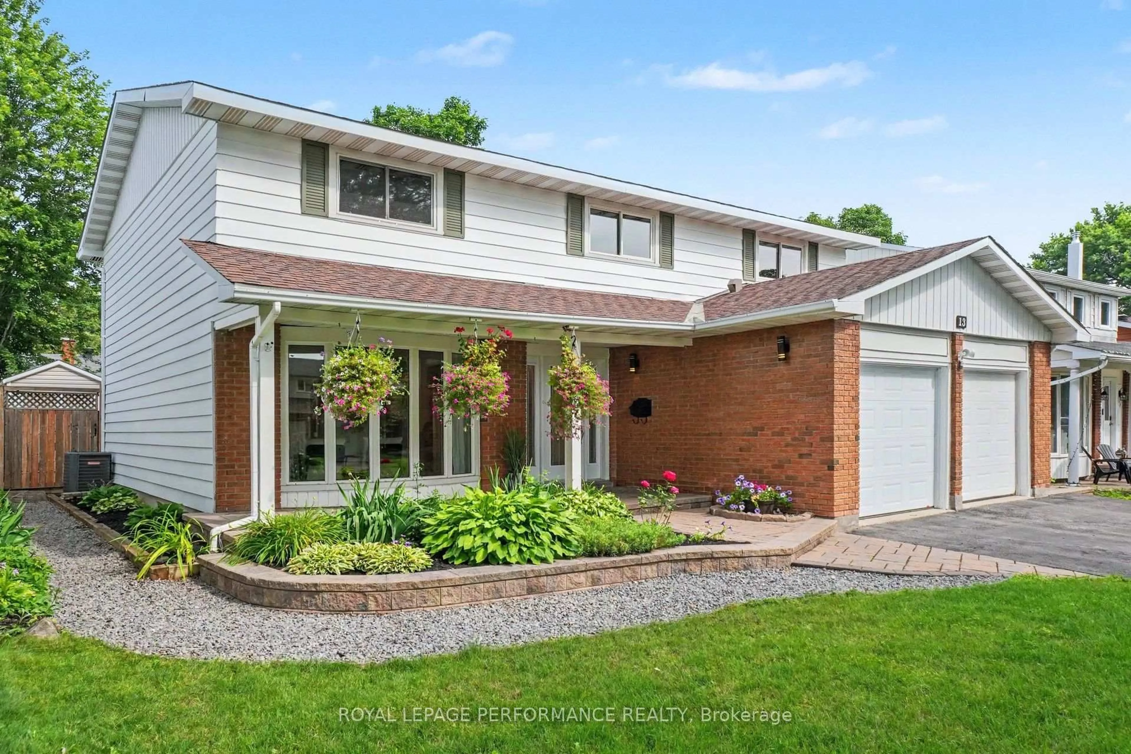 Home with brick exterior material, street for 13 Centrepark Dr, Ottawa Ontario K1B 3C2