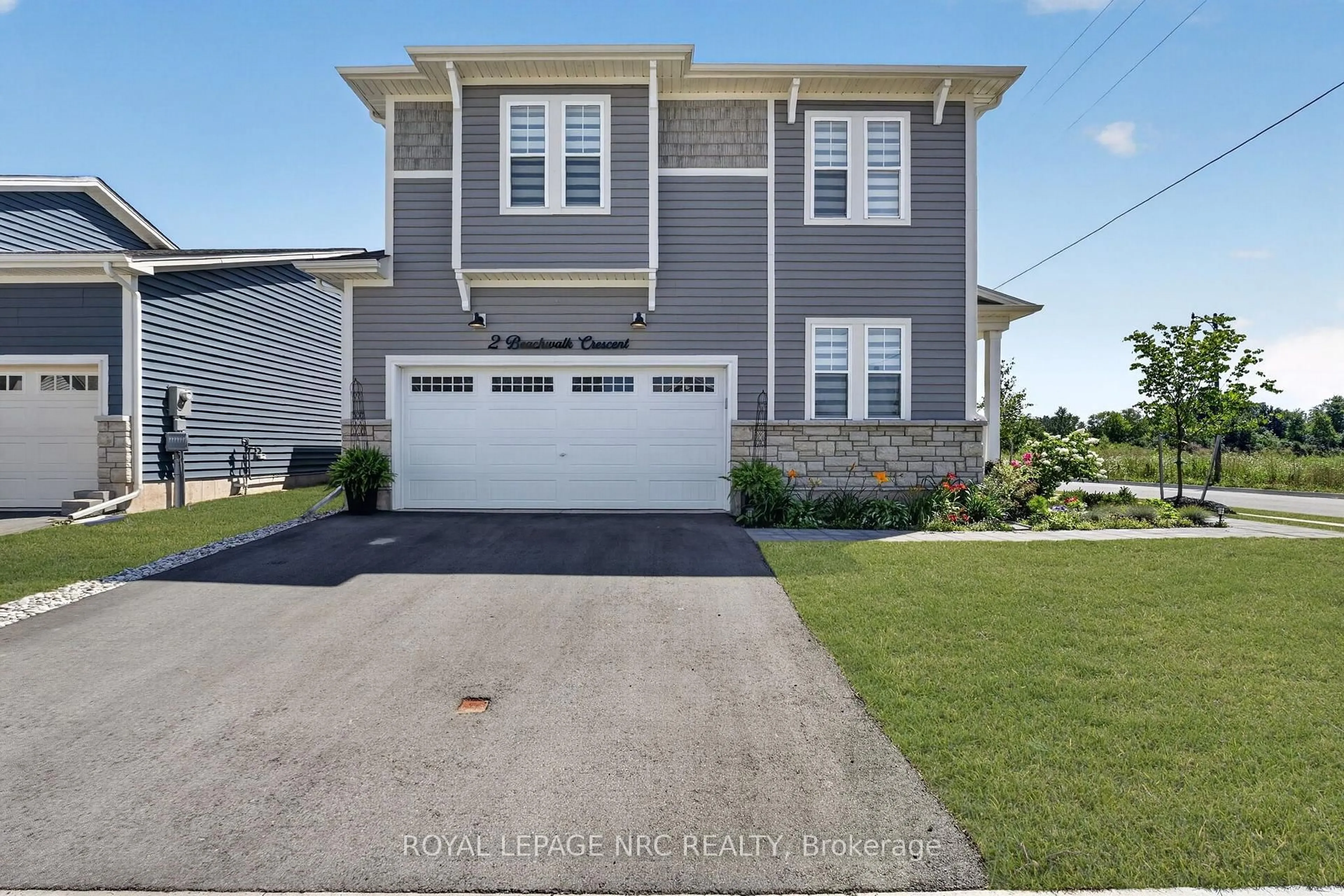 Home with vinyl exterior material, street for 2 Beachwalk Cres, Fort Erie Ontario L0S 1B0