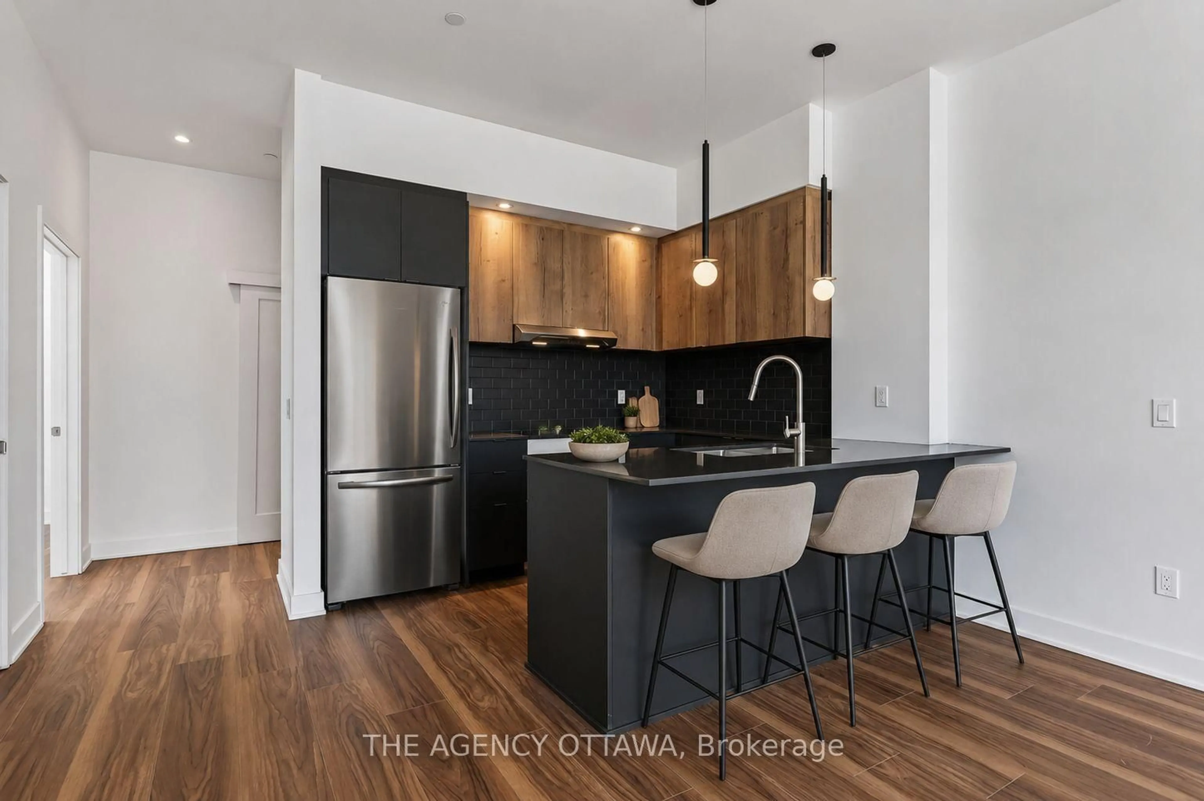 Open concept kitchen, wood/laminate floor for 3085 Riverside Dr #103, Ottawa Ontario K1V 9R2