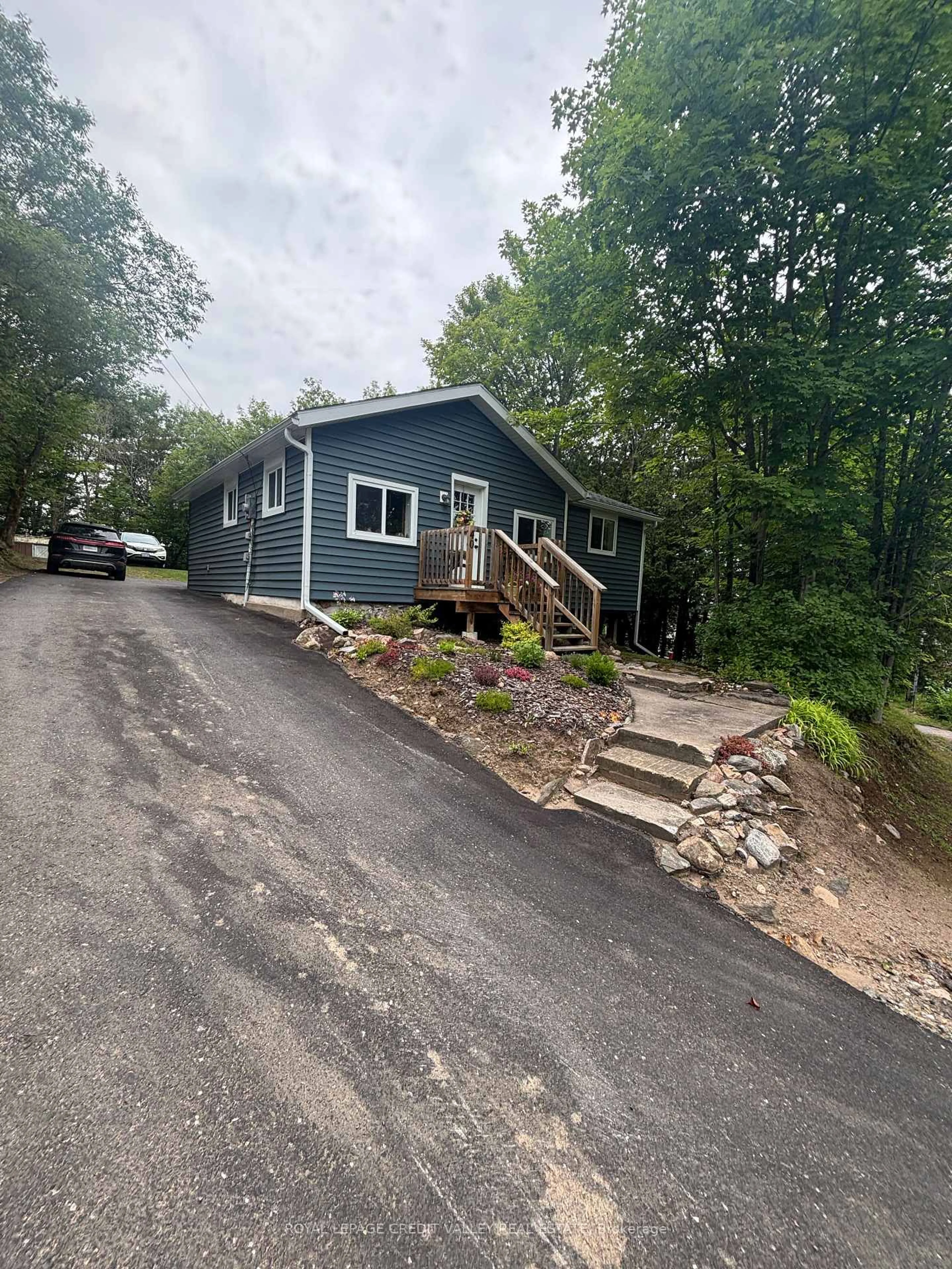 Home with vinyl exterior material, street for 39 Cleak Ave, Bancroft Ontario K0L 1C0