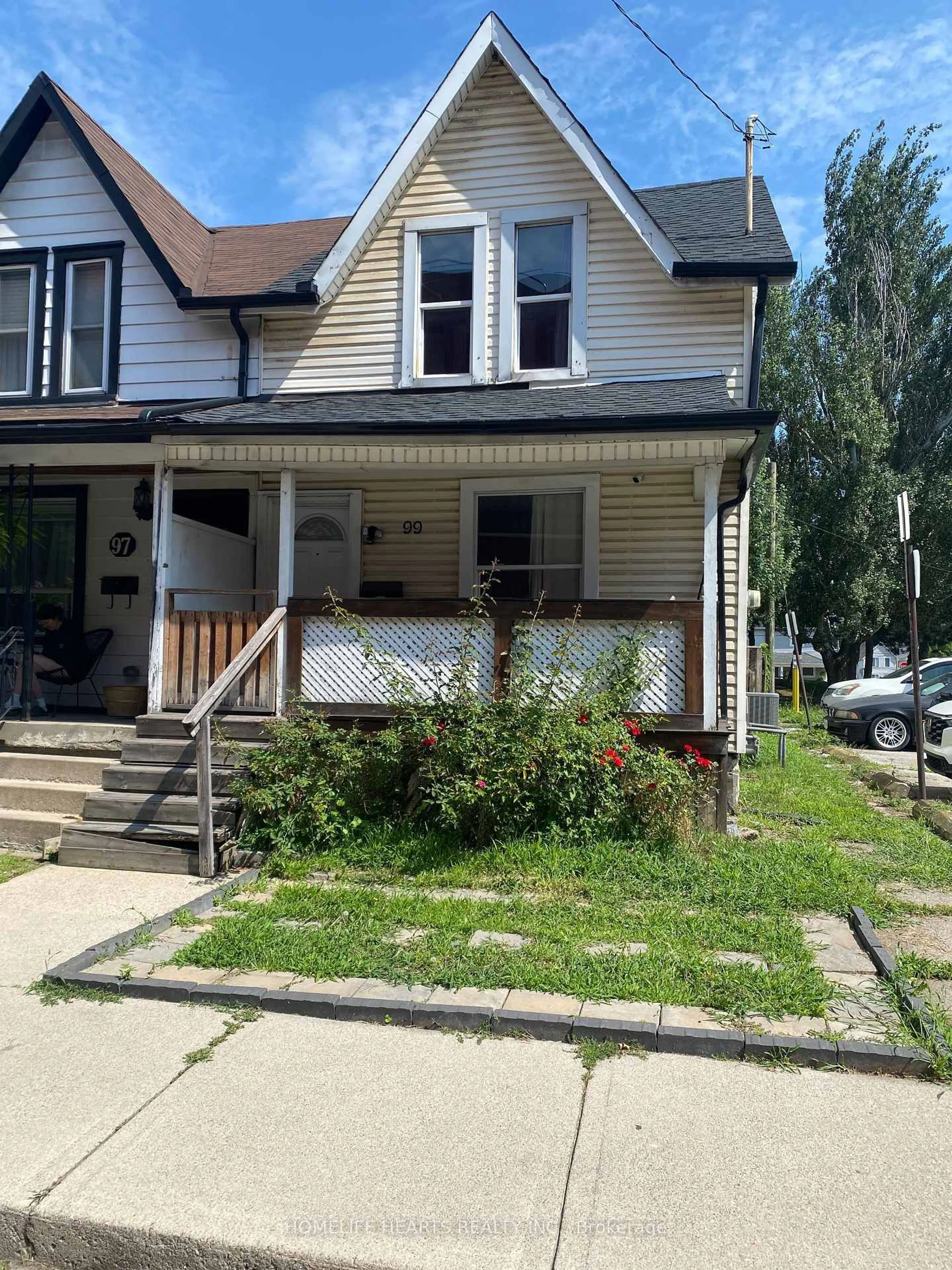 Home with vinyl exterior material, street for 99 Shaw St, Hamilton Ontario L8L 3P4