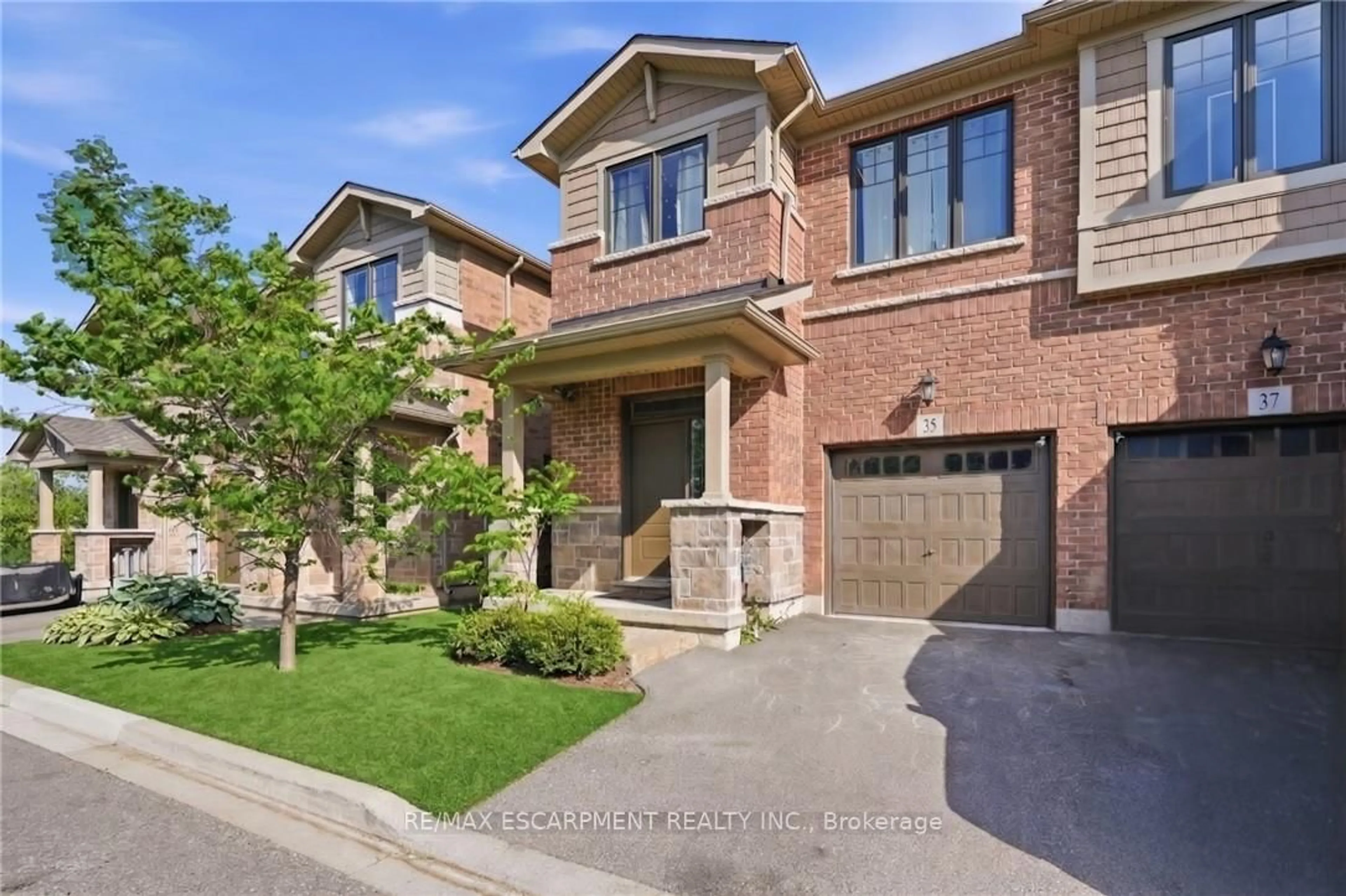 Home with brick exterior material, street for 35 Pelican Lane, Hamilton Ontario L8K 0A4