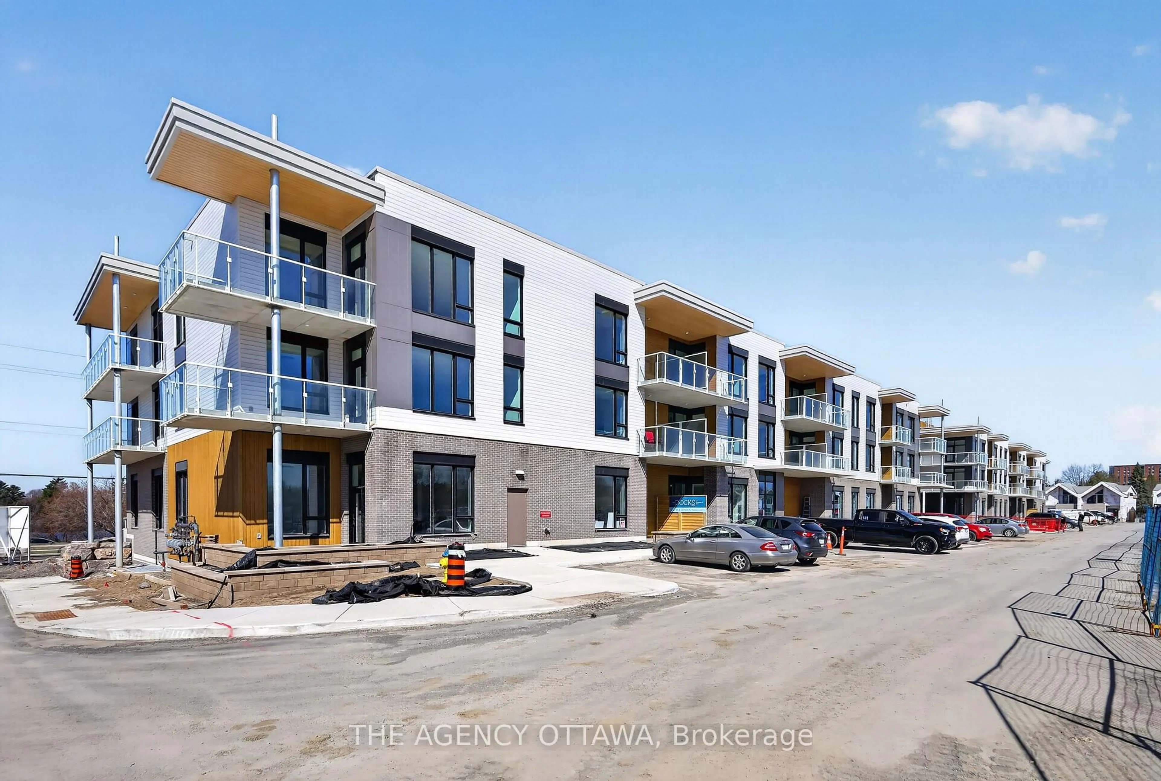 A pic from outside/outdoor area/front of a property/back of a property/a pic from drone, street for 3085 Riverside Dr #105, Ottawa Ontario K1V 9R2