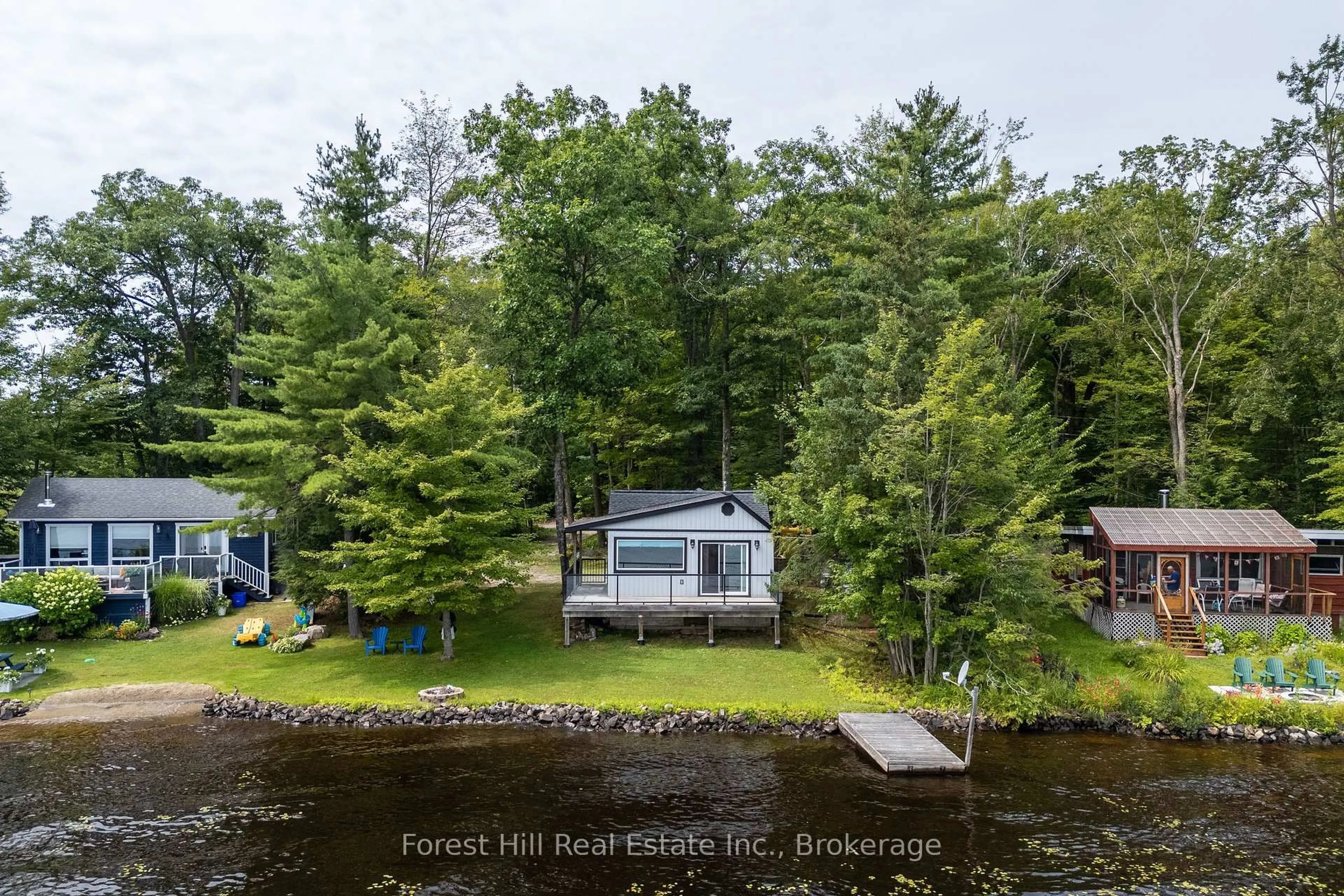 A pic from outside/outdoor area/front of a property/back of a property/a pic from drone, water/lake/river/ocean view for 1048 West Black Lake Rd, Muskoka Lakes Ontario P0C 1M0