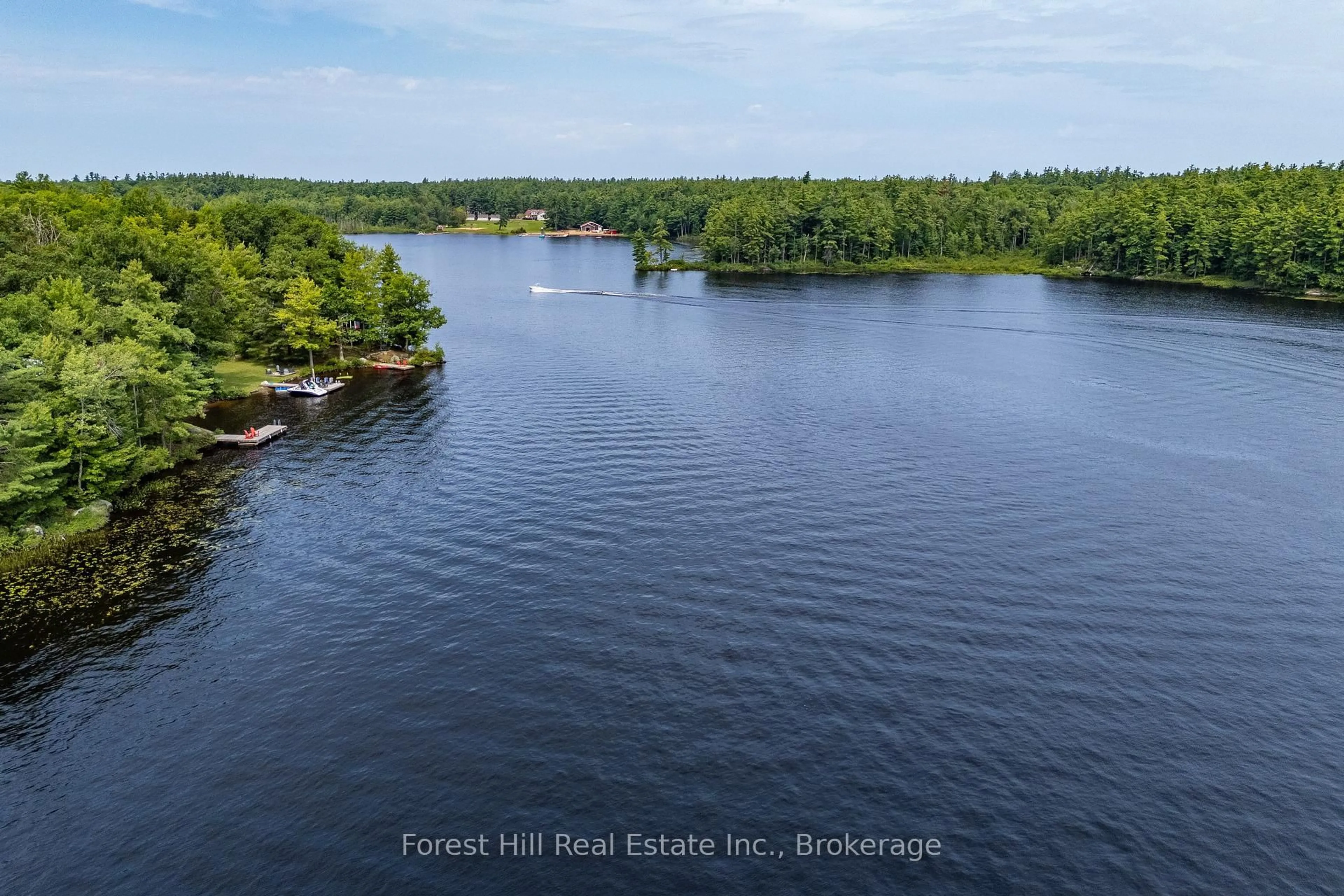 A pic from outside/outdoor area/front of a property/back of a property/a pic from drone, water/lake/river/ocean view for 1048 West Black Lake Rd, Muskoka Lakes Ontario P0C 1M0