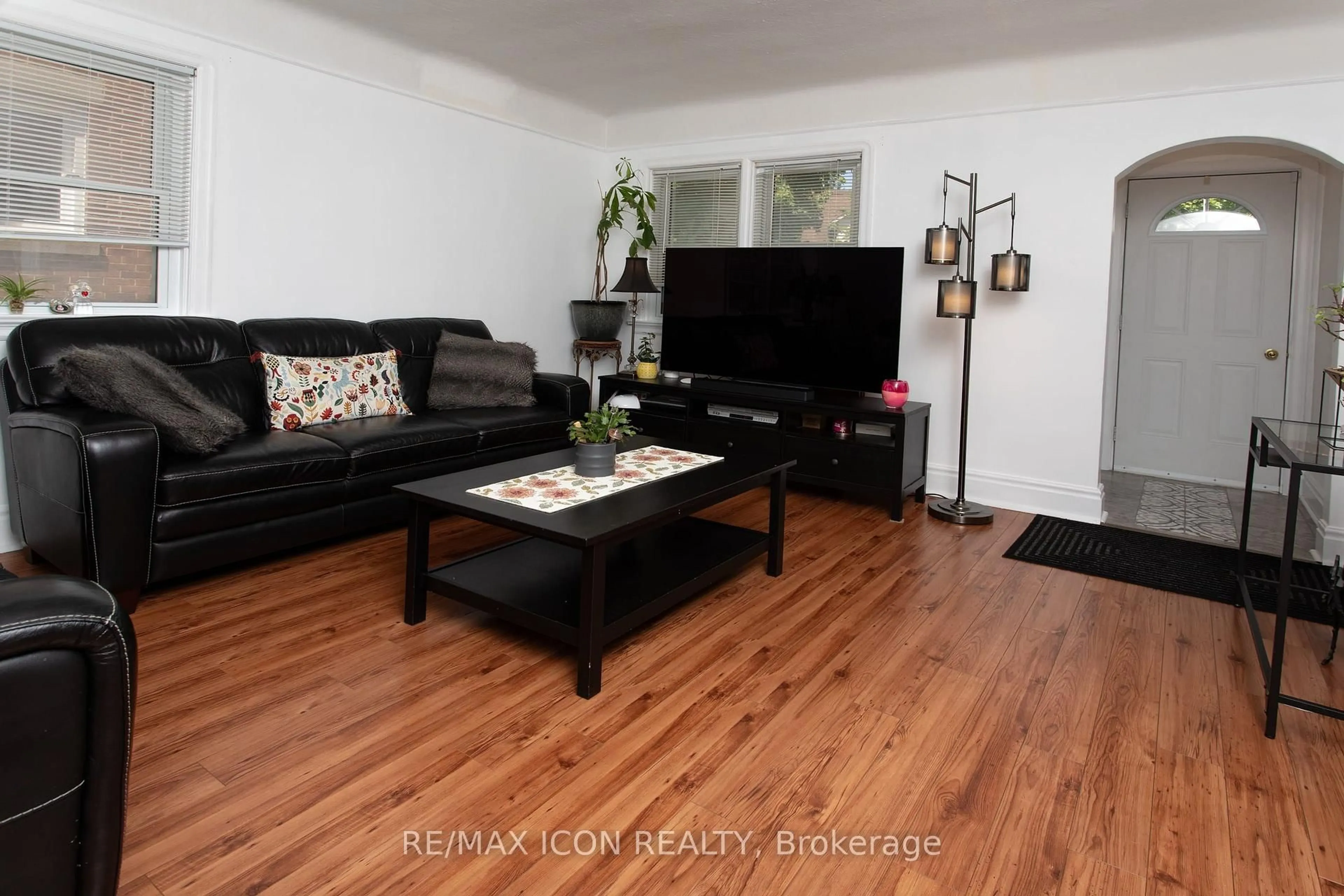 Living room with furniture, wood/laminate floor for 299 Park St, Kitchener Ontario N2G 1N2
