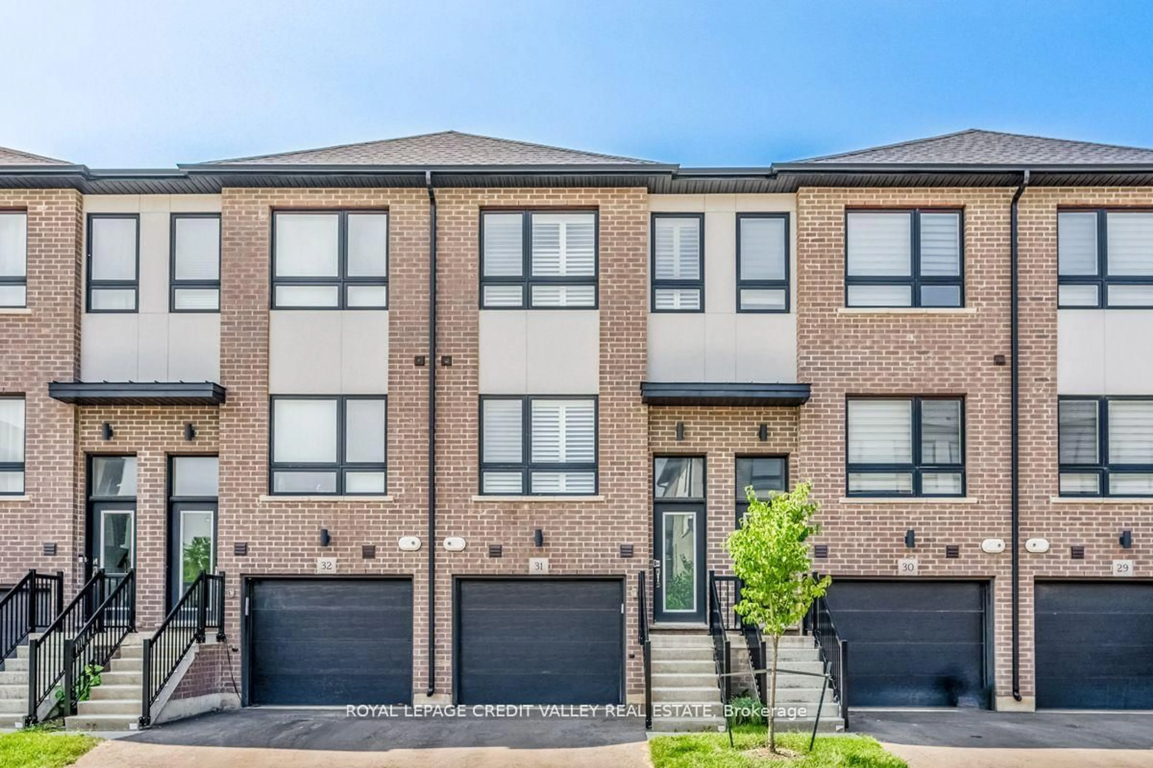 Home with brick exterior material, street for 720-31 Grey St, Brantford Ontario N3S 0K2