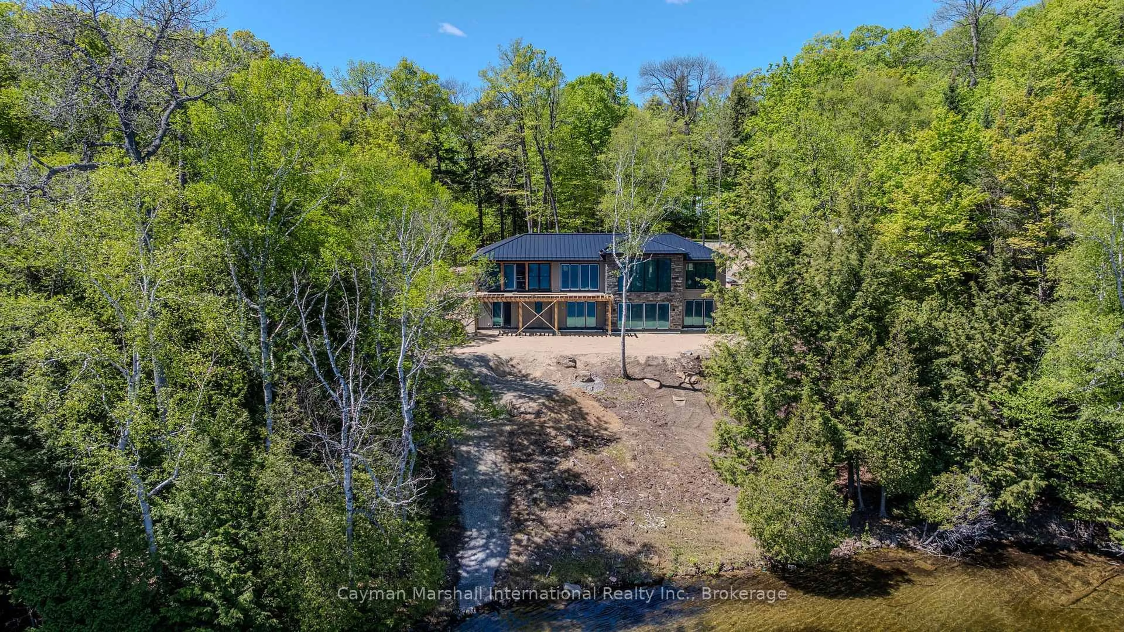 A pic from outside/outdoor area/front of a property/back of a property/a pic from drone, water/lake/river/ocean view for 1151 Elder Rd #2, Lake of Bays Ontario P0A 1H0